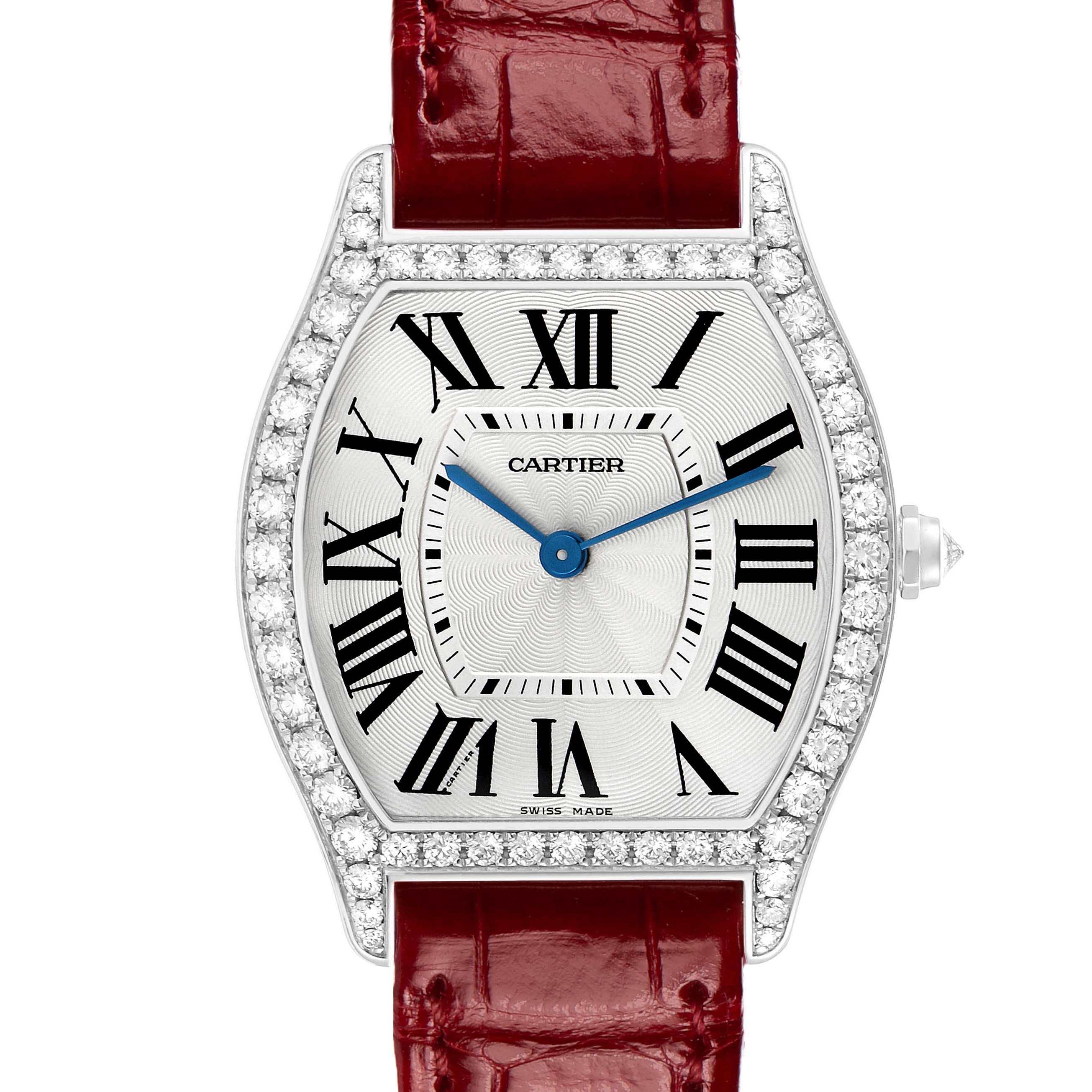The Cartier Tortue WA501009 Women's White Gold Silver Dial watch is shown from a front angle, highlighting its Roman numerals, blue hands, diamond bezel, and red strap.