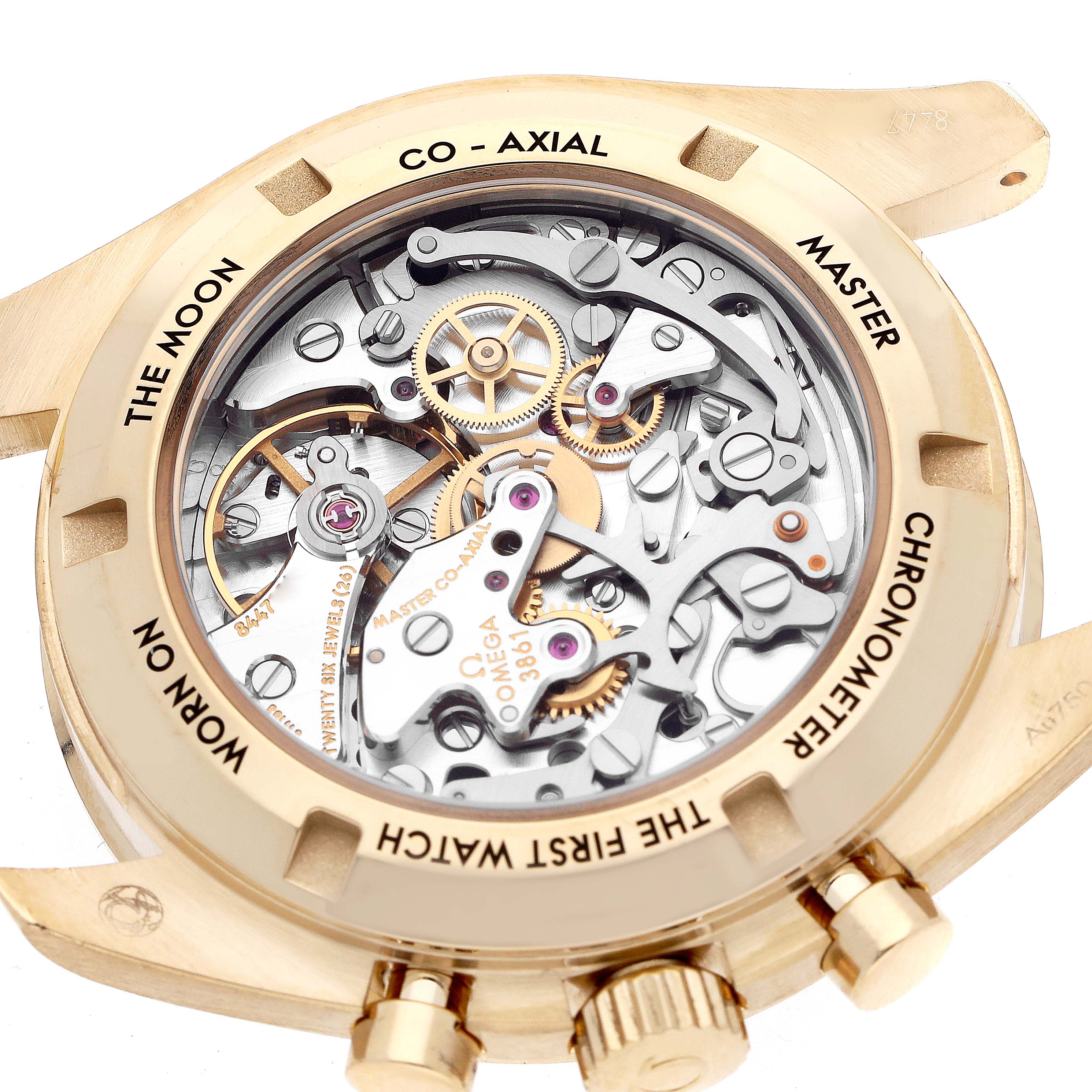 The image shows the rear view of an Omega Speedmaster 310.62.42.50.99.001 Men's Yellow Gold Champagne Dial, highlighting its mechanical movement through a transparent case back.