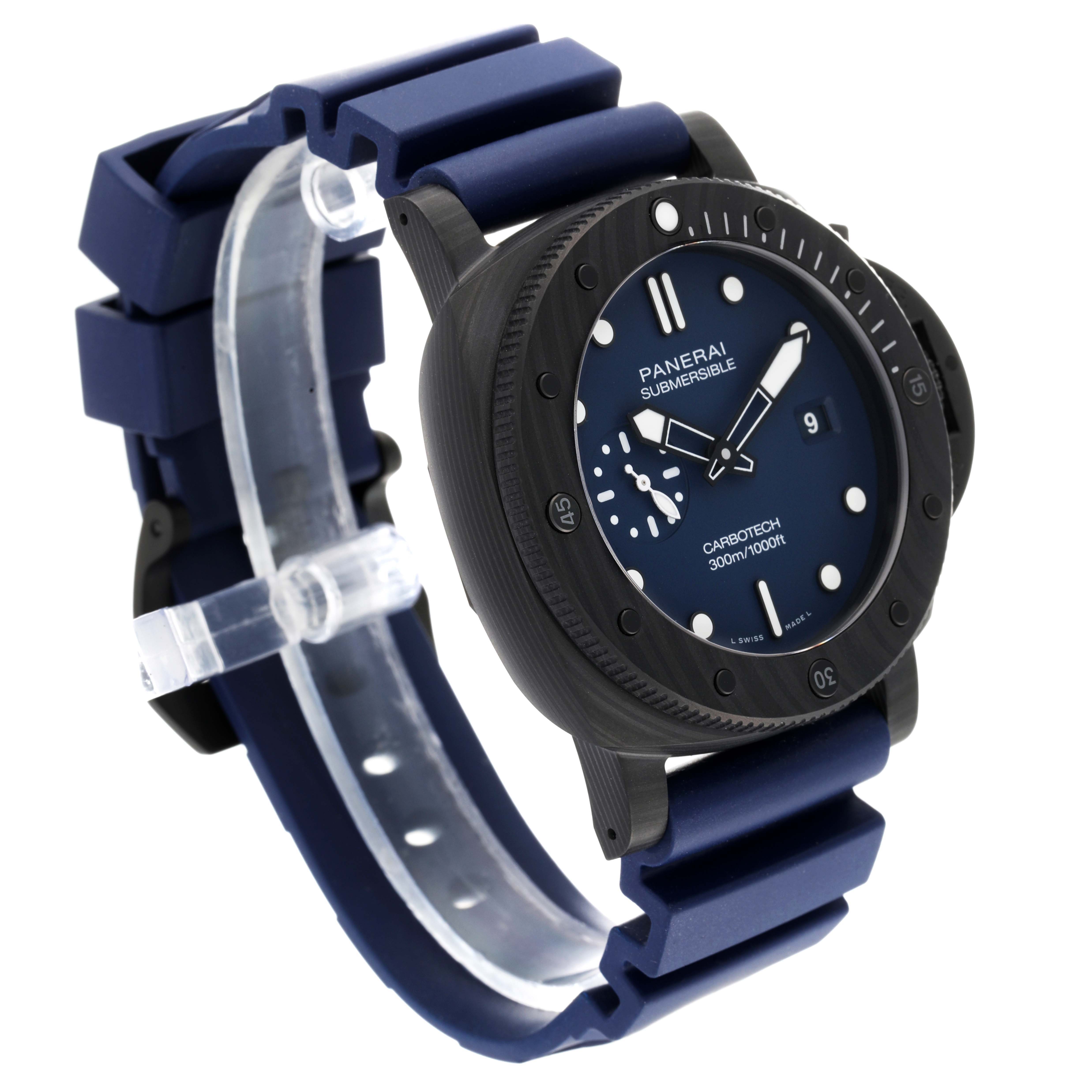 The image shows a Panerai Submersible PAM01232 Men
s Titanium Blue Dial PAM01232 Men
s Titanium Blue Dial watch at an angle highlighting its face, bezel, and blue rubber strap.