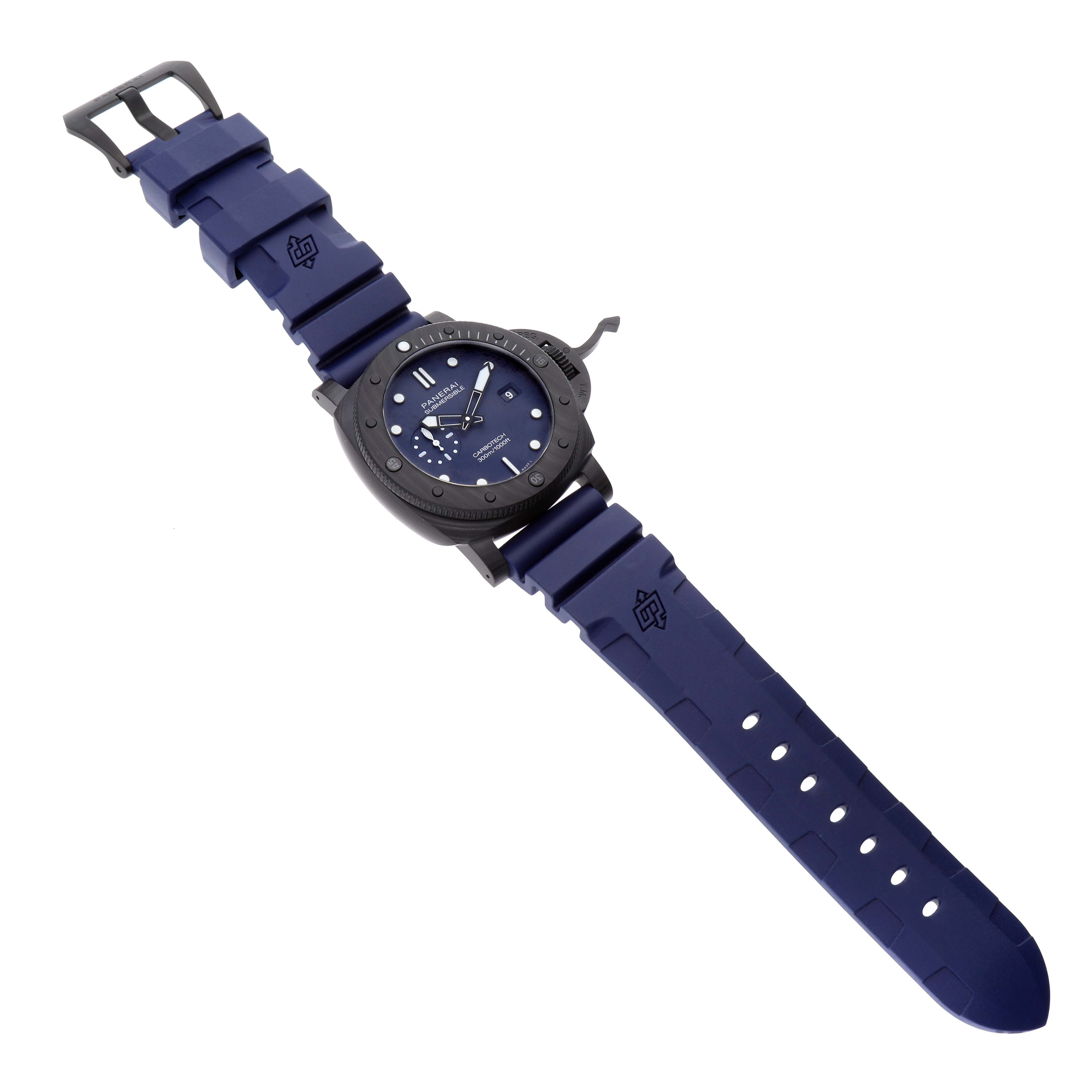 The image shows a Panerai Submersible PAM01232 Men
s Titanium Blue Dial PAM01232 Men
s Titanium Blue Dial watch with a blue rubber strap laid flat, revealing the dial and buckle.