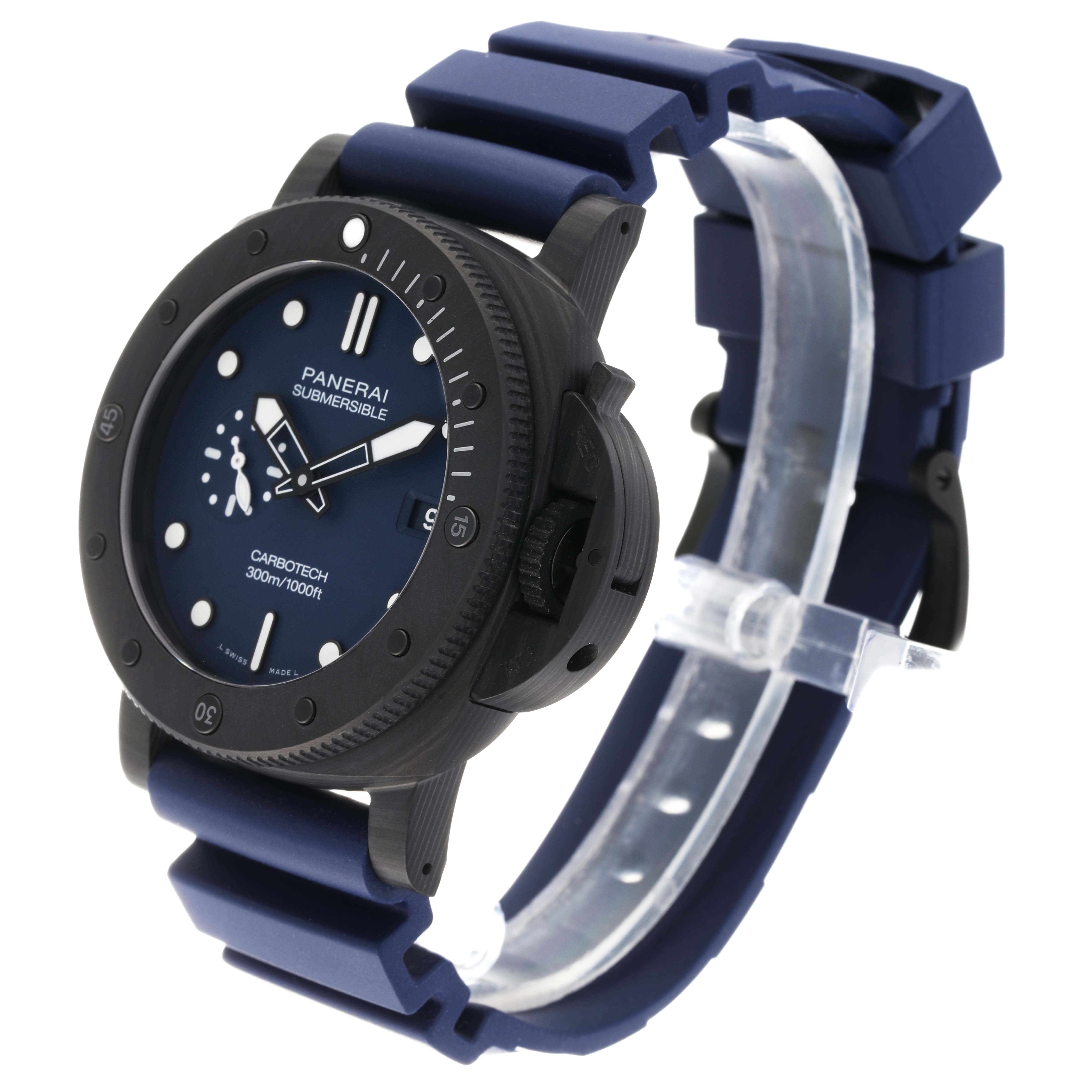 The Panerai Submersible PAM01232 Men
s Titanium Blue Dial PAM01232 Men
s Titanium Blue Dial watch is shown at an angle displaying its face, bezel, and blue rubber strap.