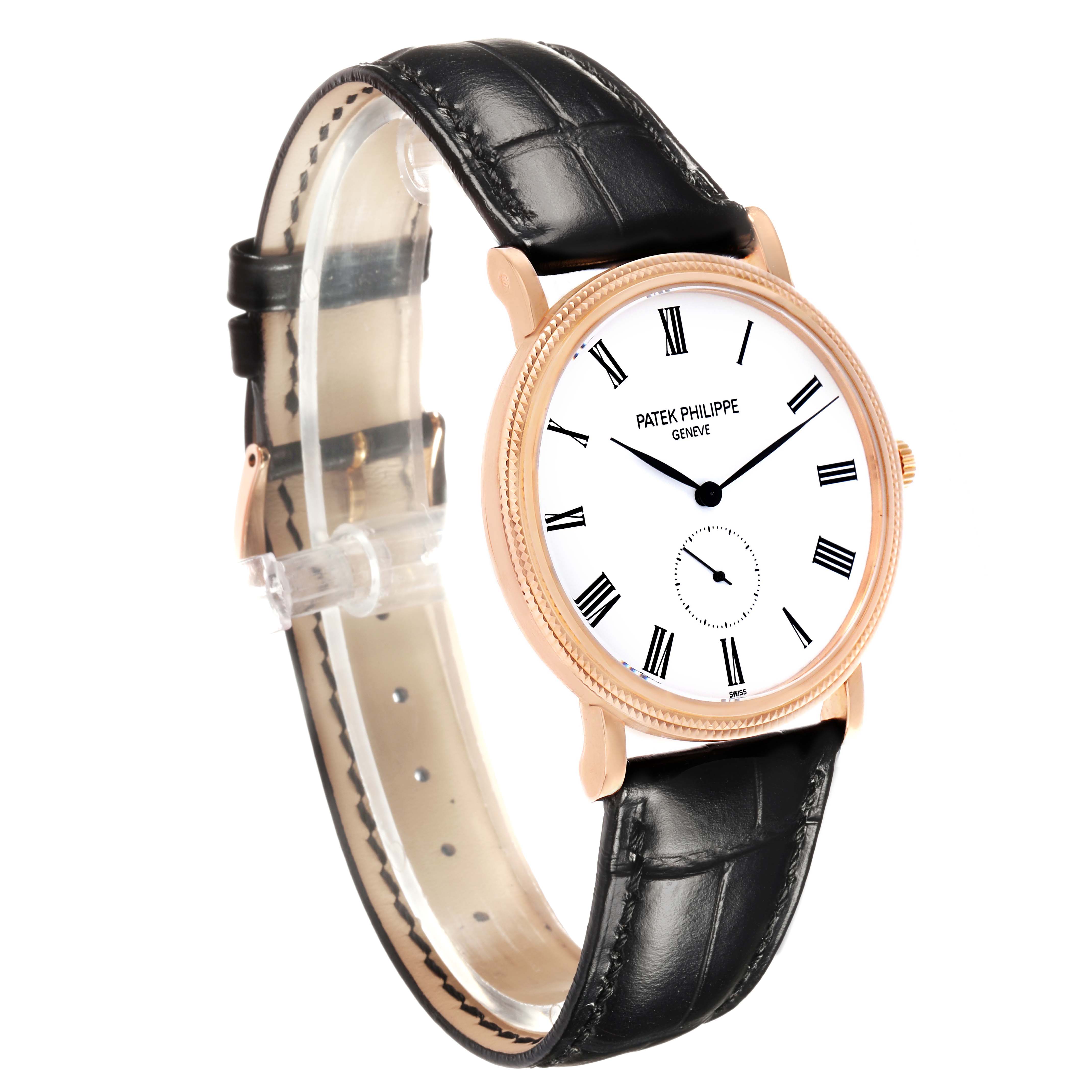 The image shows a side angle of the Patek Philippe Calatrava 5119R-001 Men's Rose Gold White Dial watch, highlighting its face, bezel, and leather strap.