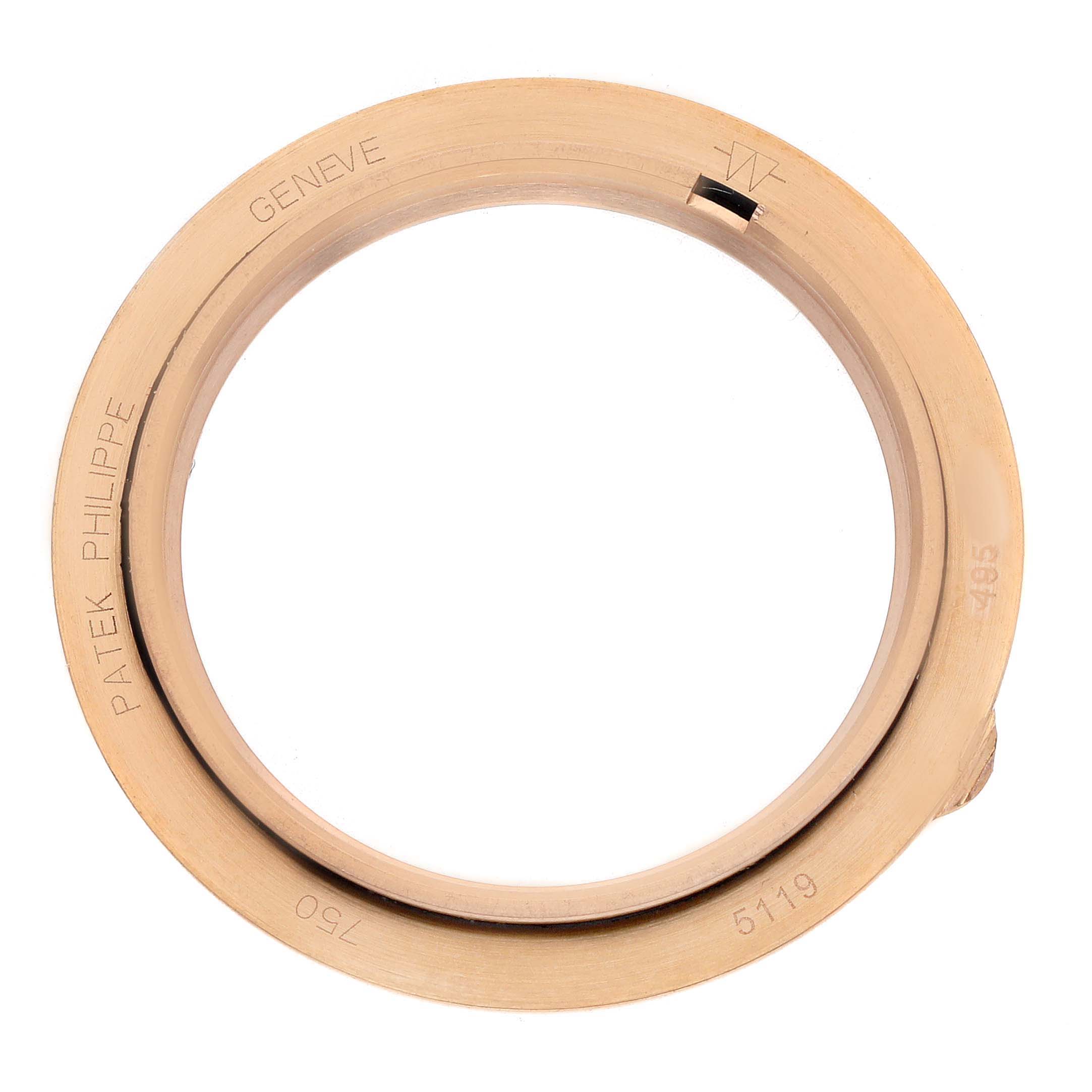 The image shows a top view of the bezel casing for a Patek Philippe Calatrava 5119R-001 Men's Rose Gold White Dial watch, with engravings visible.