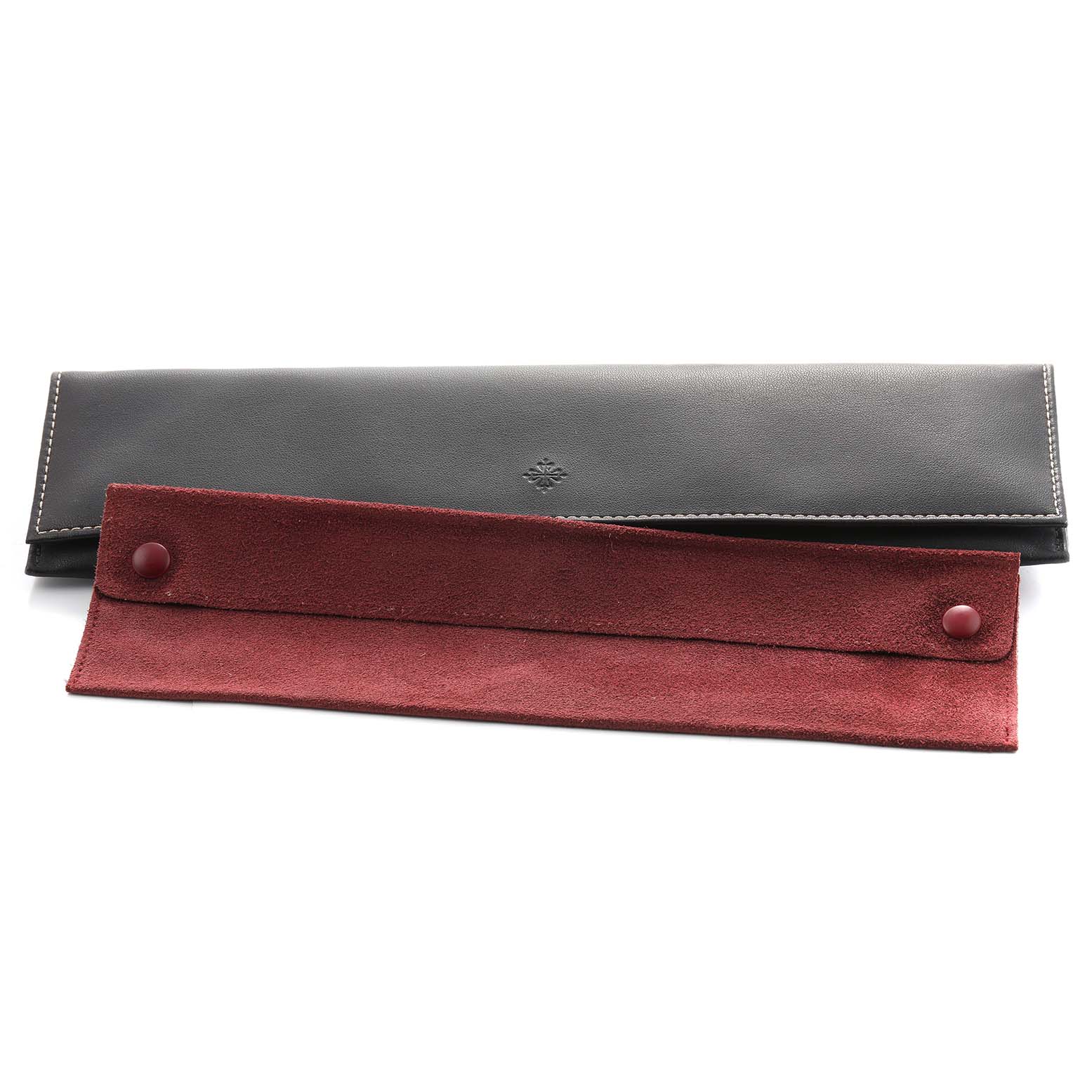 The image shows a folded leather watch pouch for the Patek Philippe Calatrava 5119G-001 Men's White Gold White Dial, featuring black exterior and red suede interior.