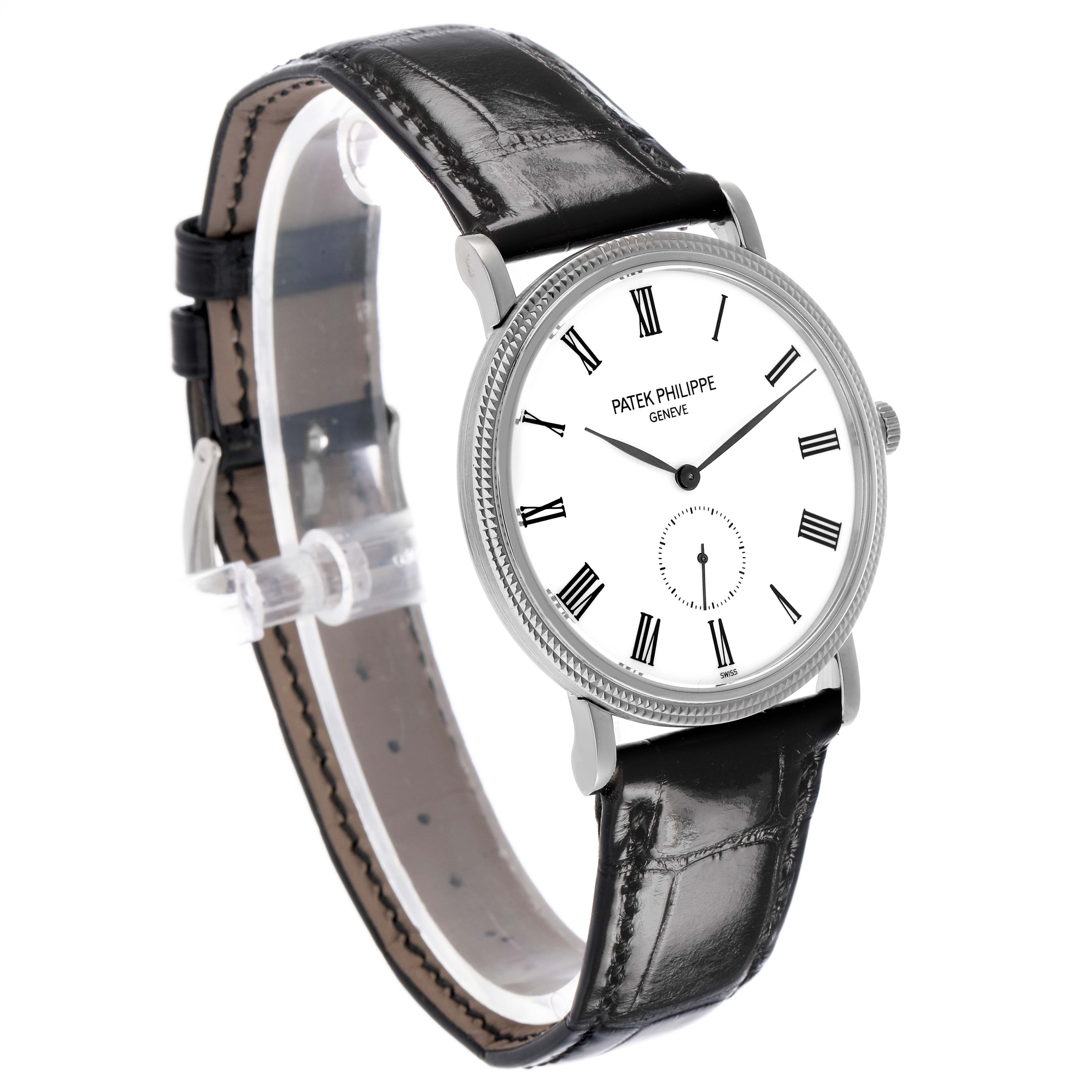 The Patek Philippe Calatrava 5119G-001 Men's White Gold White Dial watch is shown at a slight angle, highlighting the face, bezel, and black leather strap.