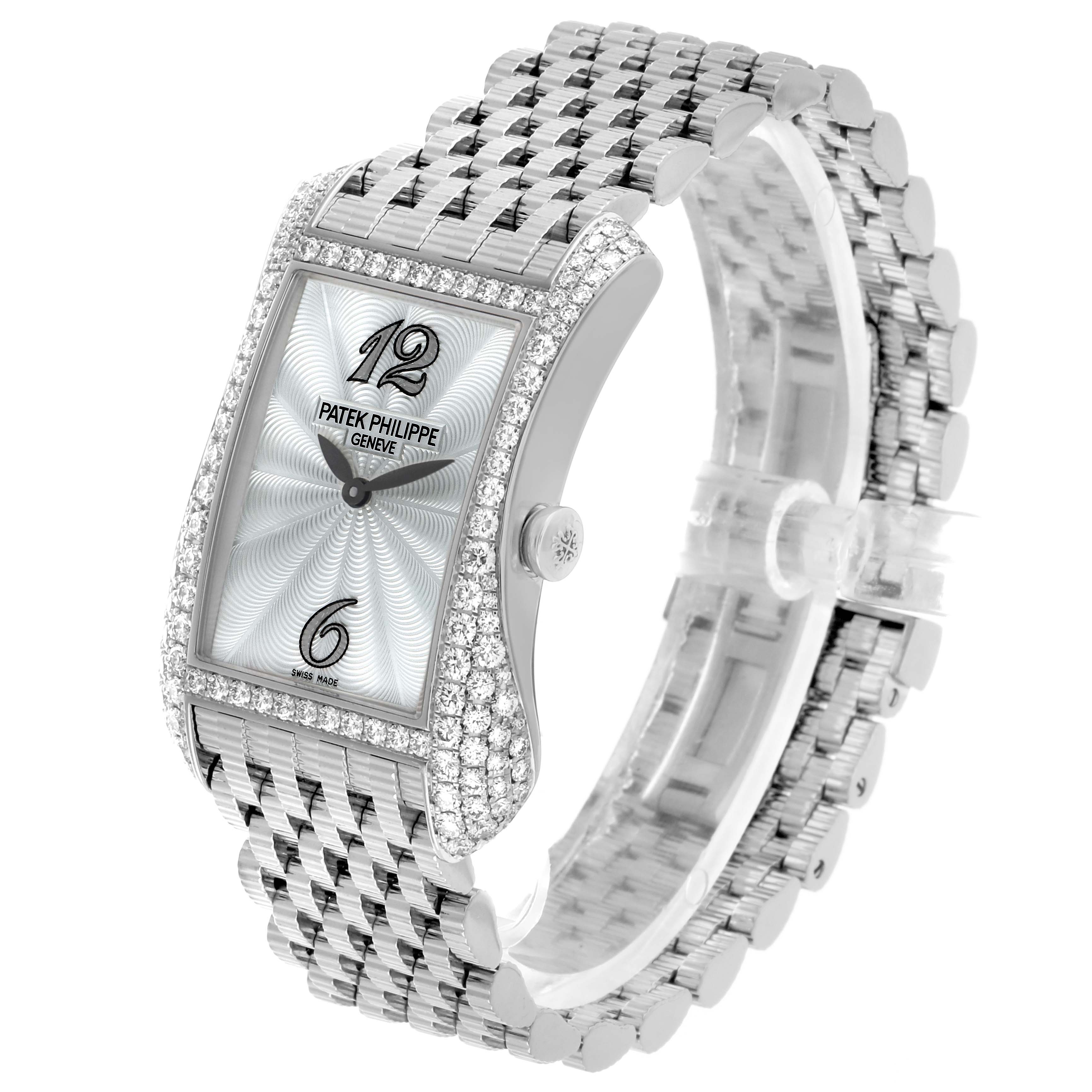 The Patek Philippe Gondolo 4972/1G-001 Women's White Gold Mother of Pearl Dial watch is shown at a three-quarter angle, highlighting its face, crown, and bracelet.