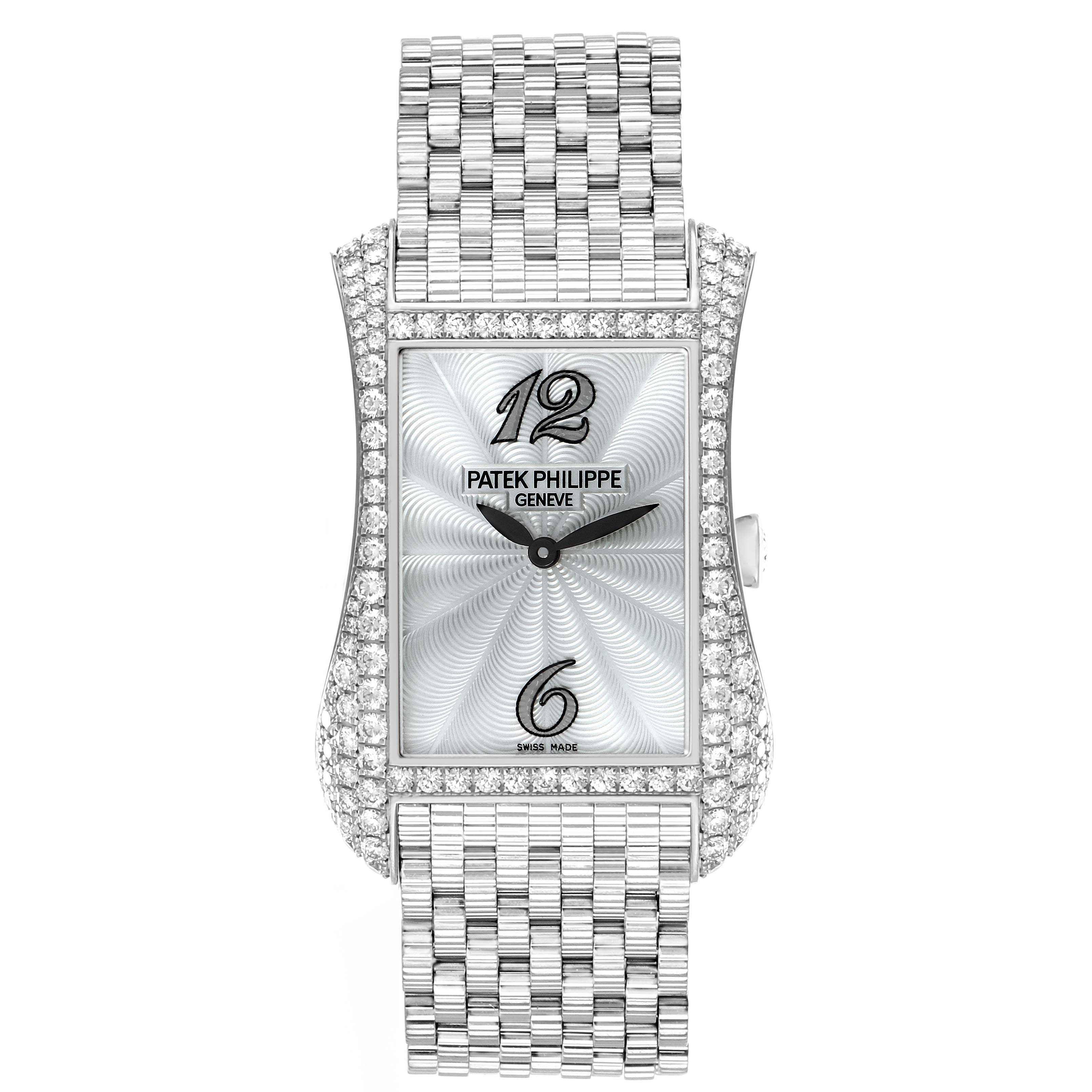 The Patek Philippe Gondolo 4972/1G-001 Women's White Gold Mother of Pearl Dial watch is shown from a front angle, highlighting its rectangular case, diamond bezel, and textured bracelet.