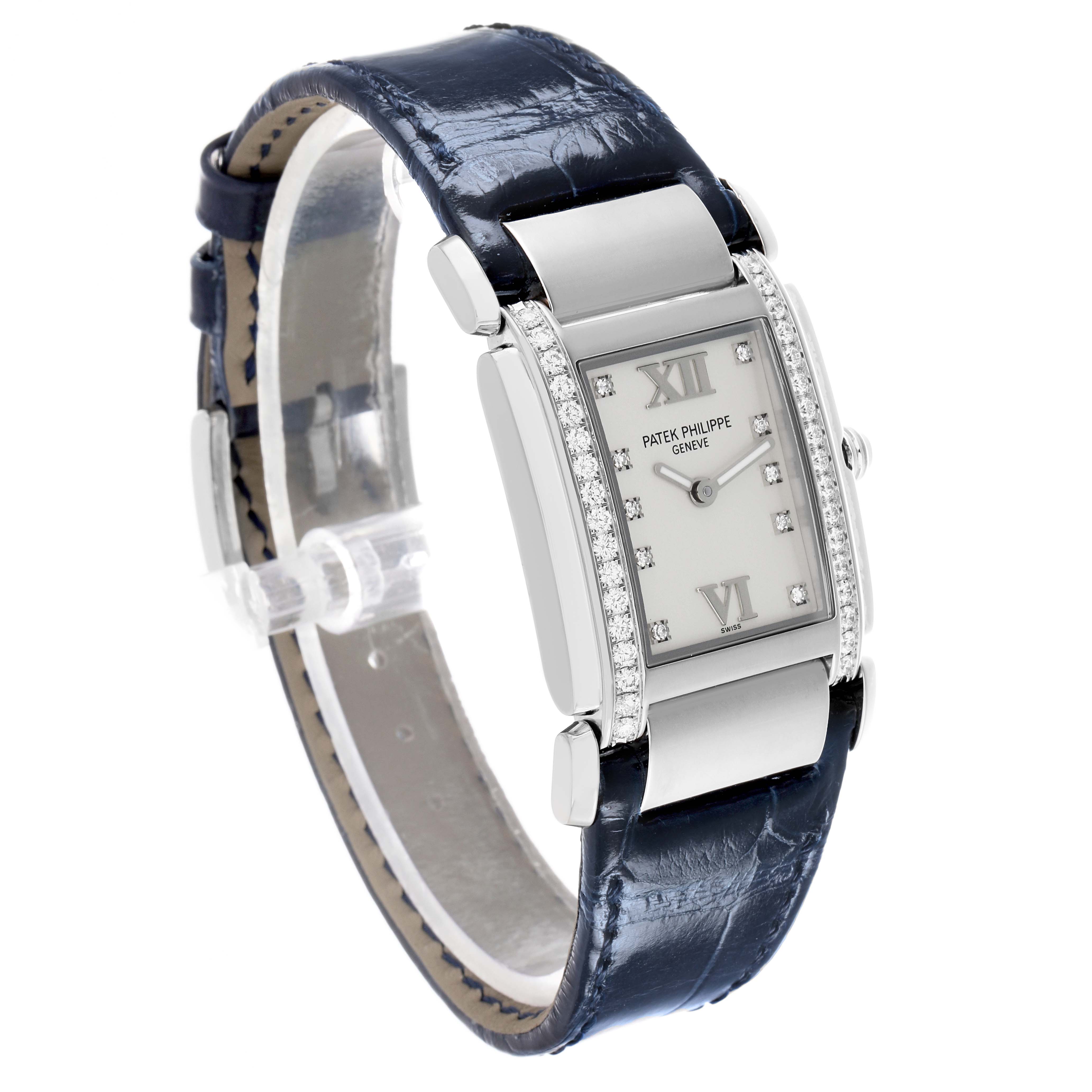 The Patek Philippe Twenty-4 4920G-010 Women's White Gold Silver Dial watch is shown at a three-quarter angle, displaying the face, diamond-set sides, and leather strap.