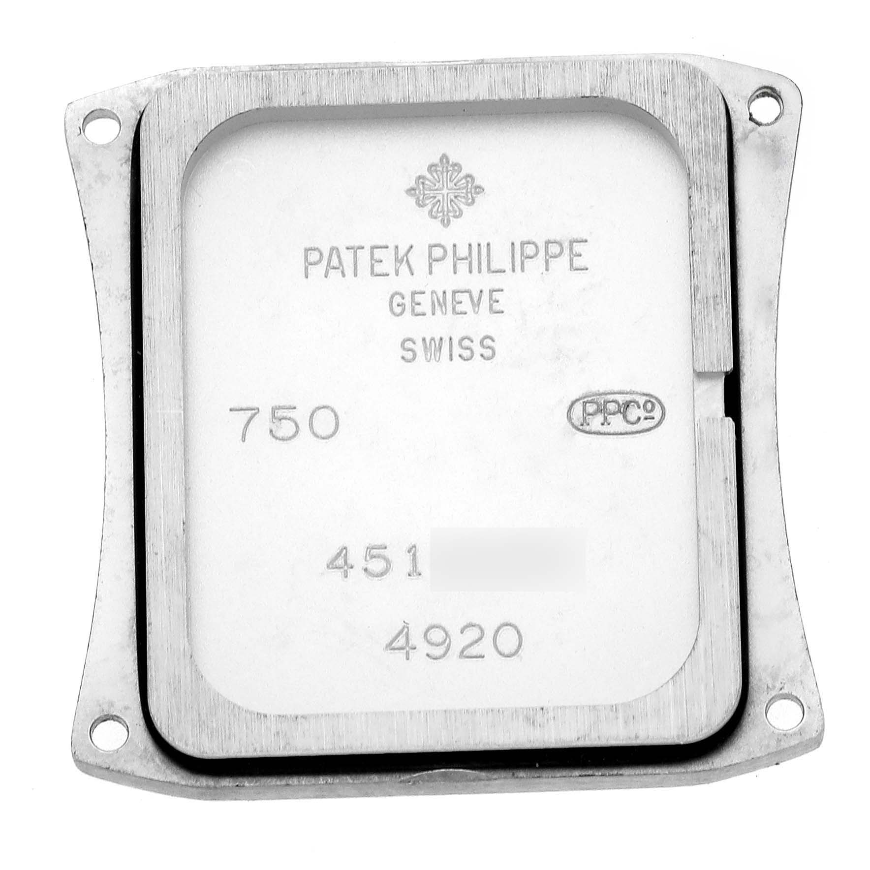 The image shows the back case of the Patek Philippe Twenty-4 4920G-010 Women's White Gold Silver Dial watch, focusing on engravings and brand markings.