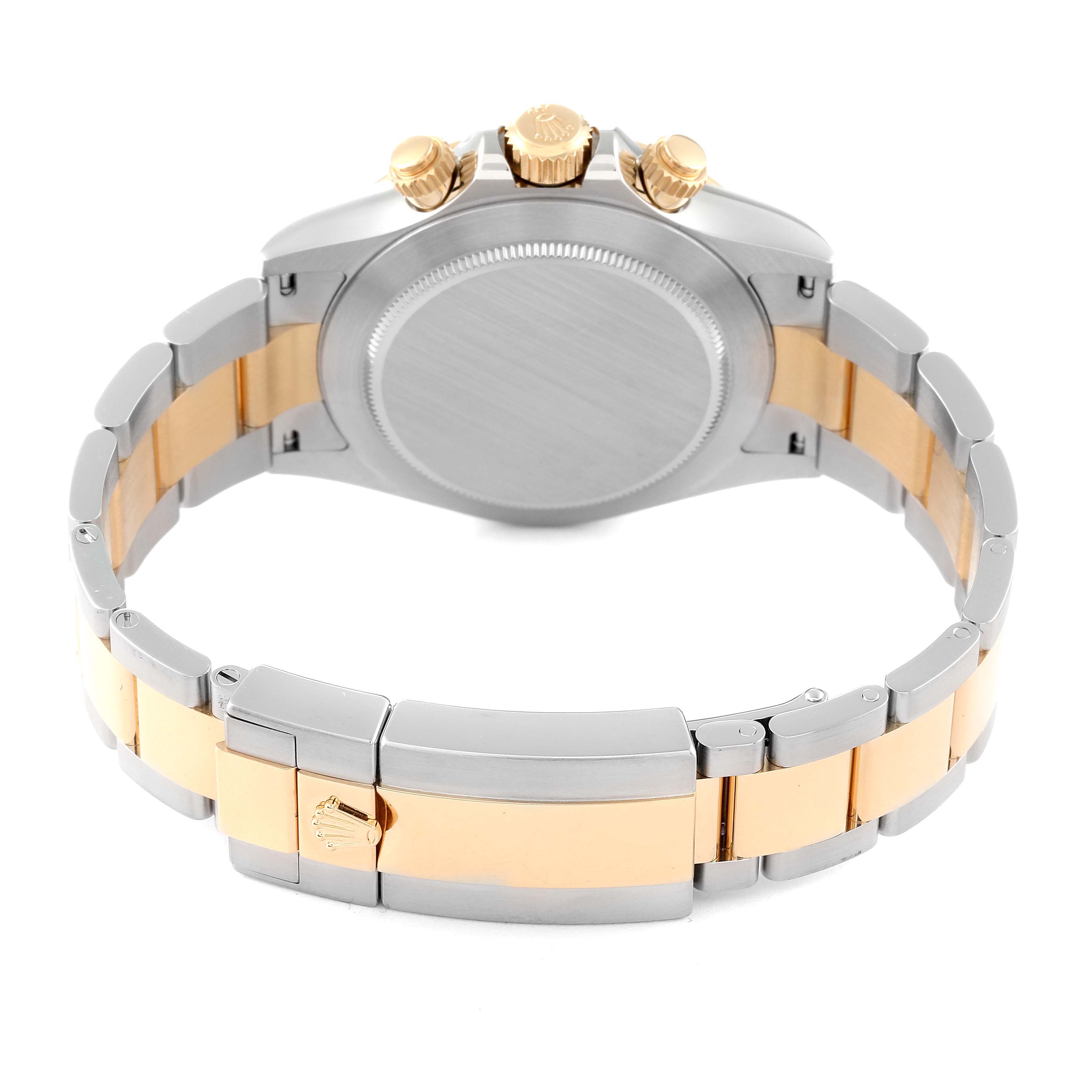 This image shows the back view of the Rolex Daytona 116503 Men's Steel and Gold (two tone) Black Dial 116503 Men's Steel and Gold (two tone) Black Dial watch, highlighting its case back, bracelet, and clasp.