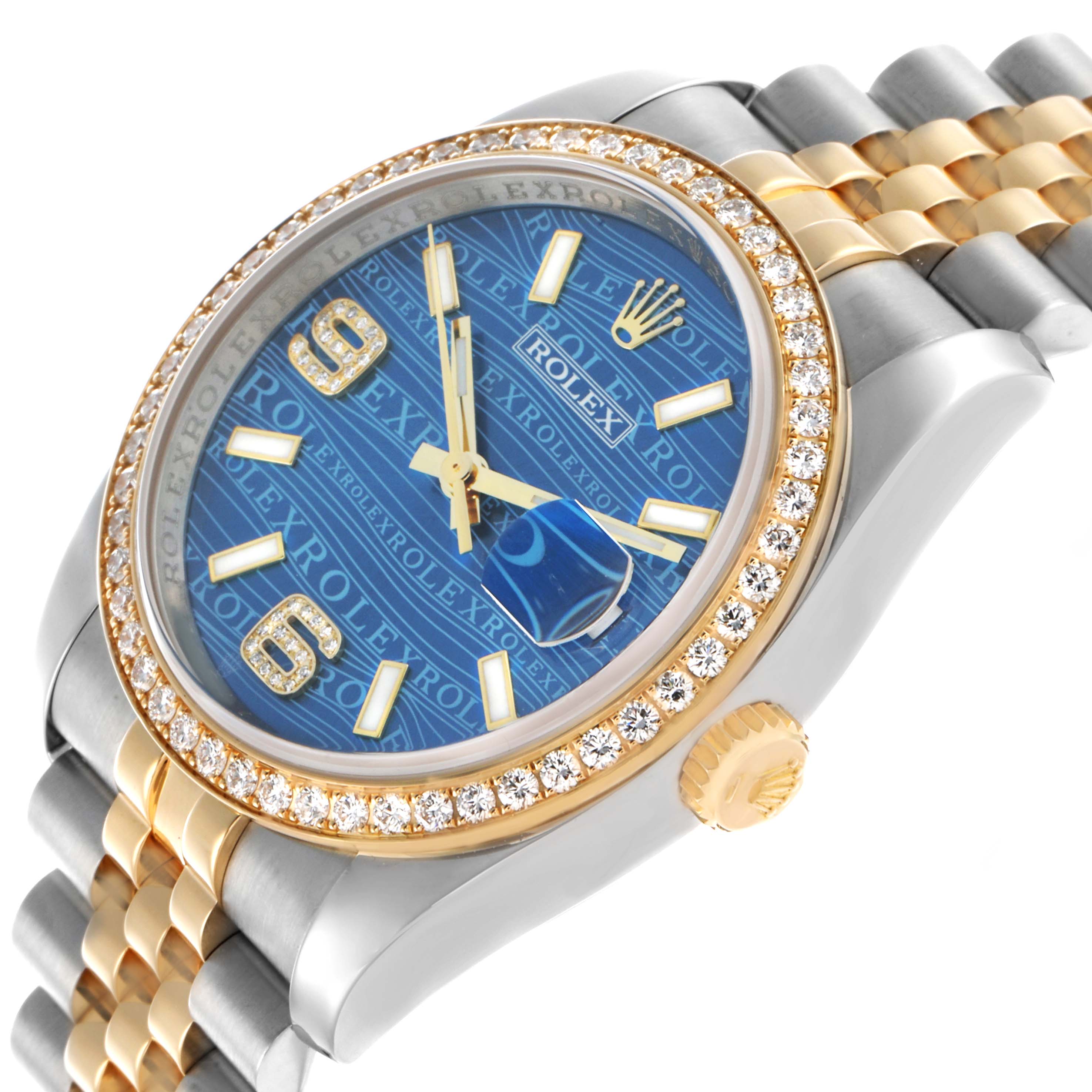 This Rolex Datejust 116243 Men's Steel and Gold (two tone) Blue Dial watch is shown at an angle highlighting the blue dial, diamond bezel, and two-tone bracelet.