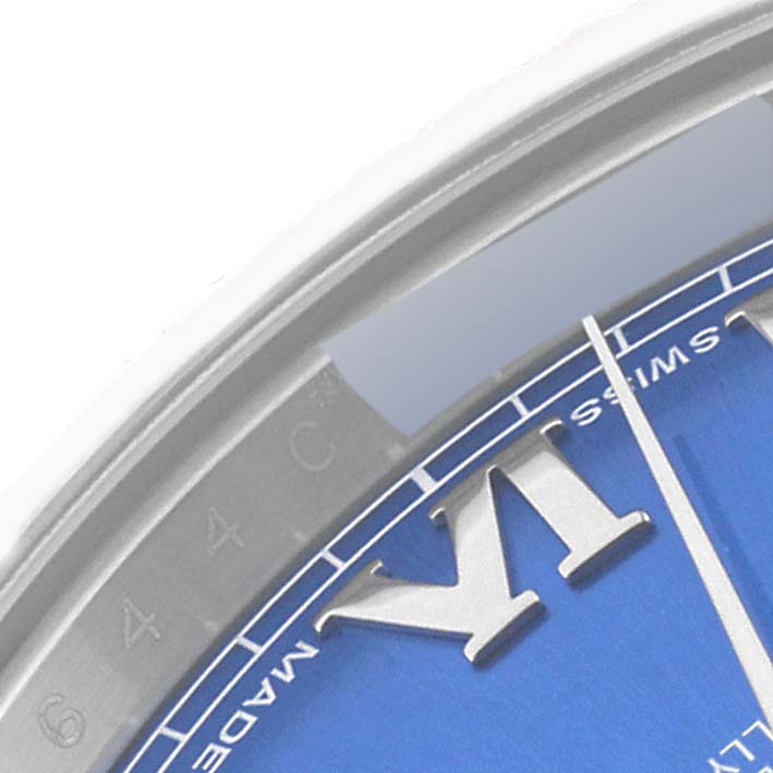 The image shows a close-up of the dial and minute track of a Rolex Datejust 41 116334 Men
s Stainless Steel Blue Dial 116334 Men
s Stainless Steel Blue Dial, highlighting the Roman numeral VI and blue dial.