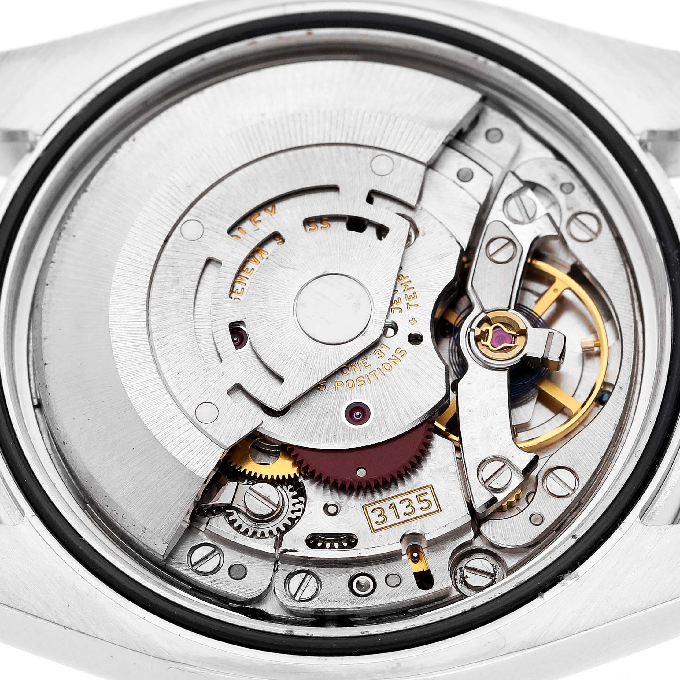 The image shows a close-up view of the movement mechanism inside a Rolex Datejust 116244 Men's Stainless Steel Silver Dial 116244 Men's Stainless Steel Silver Dial watch.