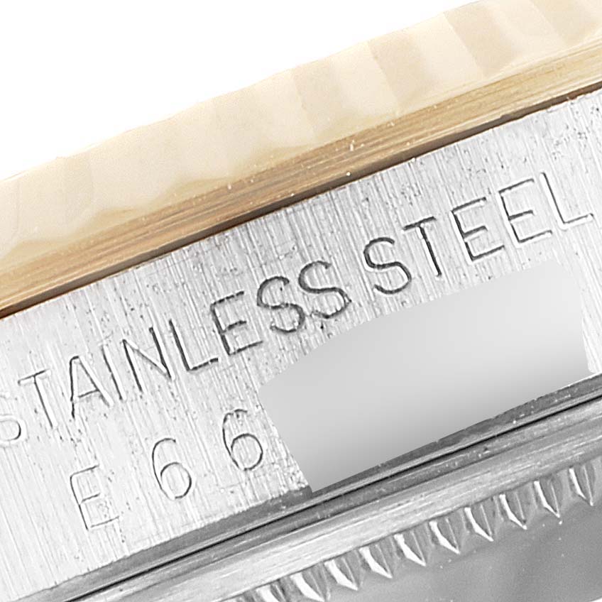 The image shows a close-up of the stainless steel case and the rehaut engraving on a Rolex Datejust 16233 Men's Steel and Gold (two tone) Silver Dial 16233 Men's Steel and Gold (two tone) Silver Dial watch.