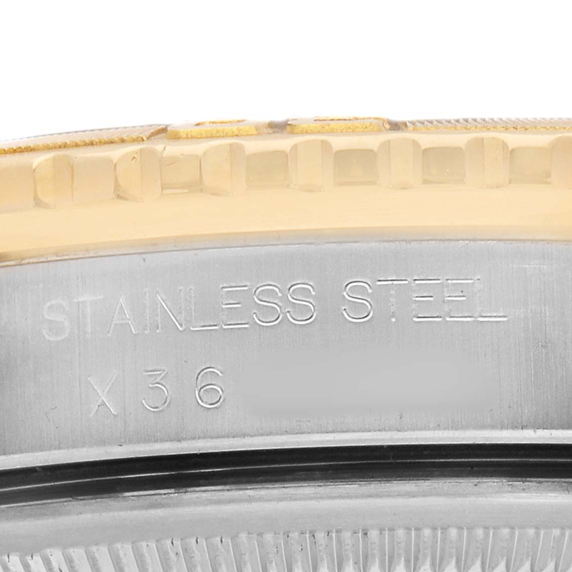 The angle shows the side of a Rolex Turn-o-Graph 16263 Men's Steel and Gold (two tone) Champagne Dial watch, highlighting the stainless steel case and part of the bezel.