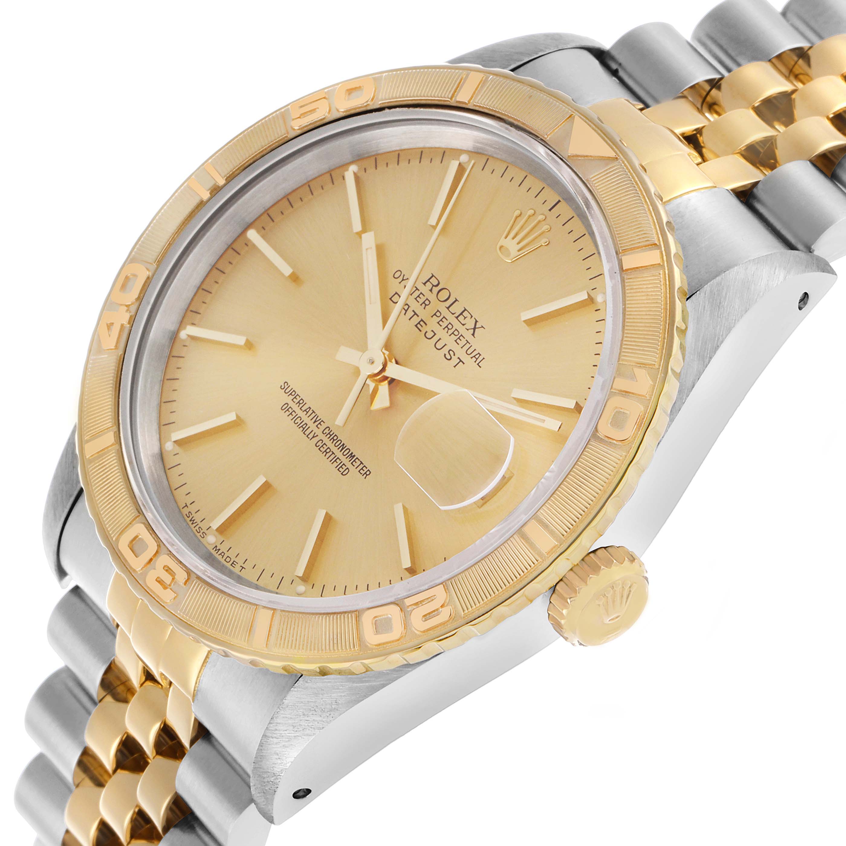 The Rolex Turn-o-Graph 16263 Men's Steel and Gold (two tone) Champagne Dial watch is shown at a tilted angle, highlighting the bezel, dial, crown, and bracelet.