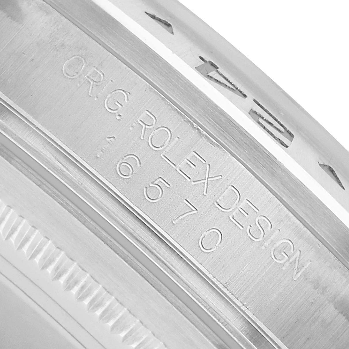 The image shows a close-up of the watch case side of a Rolex Explorer 16570 Men's Stainless Steel White Dial, highlighting the engraving.