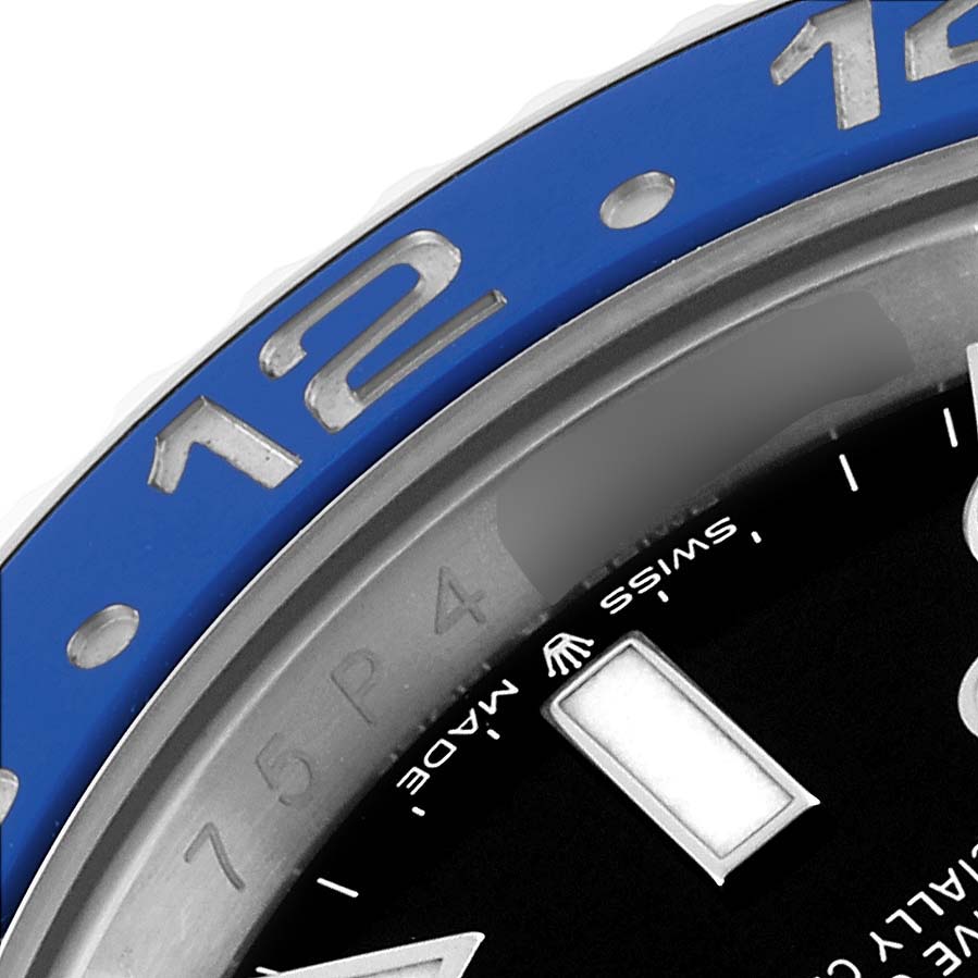 The image shows a close-up of the blue bezel and partial dial, including the "Swiss" label of the Rolex GMT-Master 126710BLNR Men
s Stainless Steel Black Dial 126710BLNR Men
s Stainless Steel Black Dial watch.
