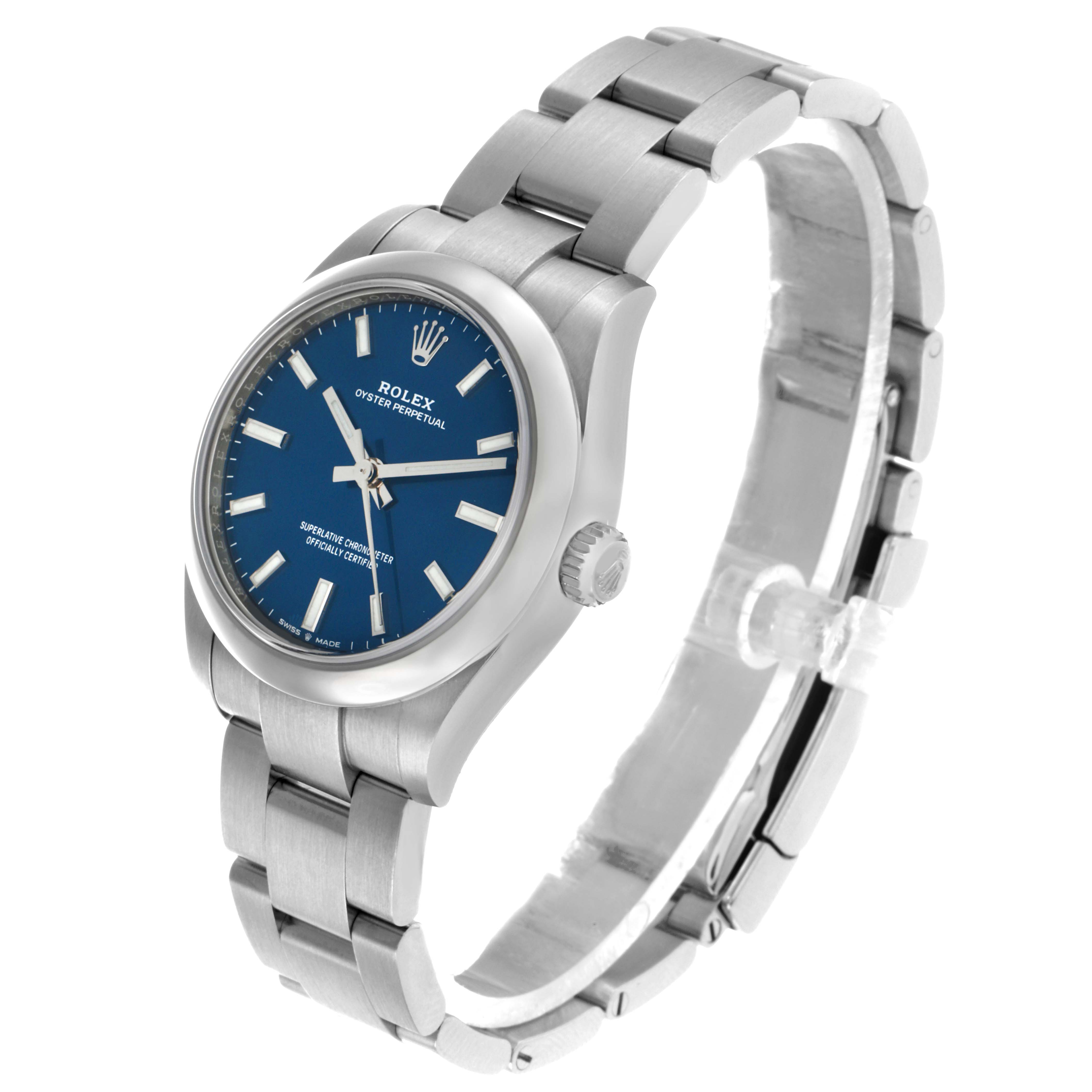 The Rolex Mid-Size 277200 Women's Stainless Steel Blue Dial watch is shown at an angle displaying the dial, case, crown, and bracelet.