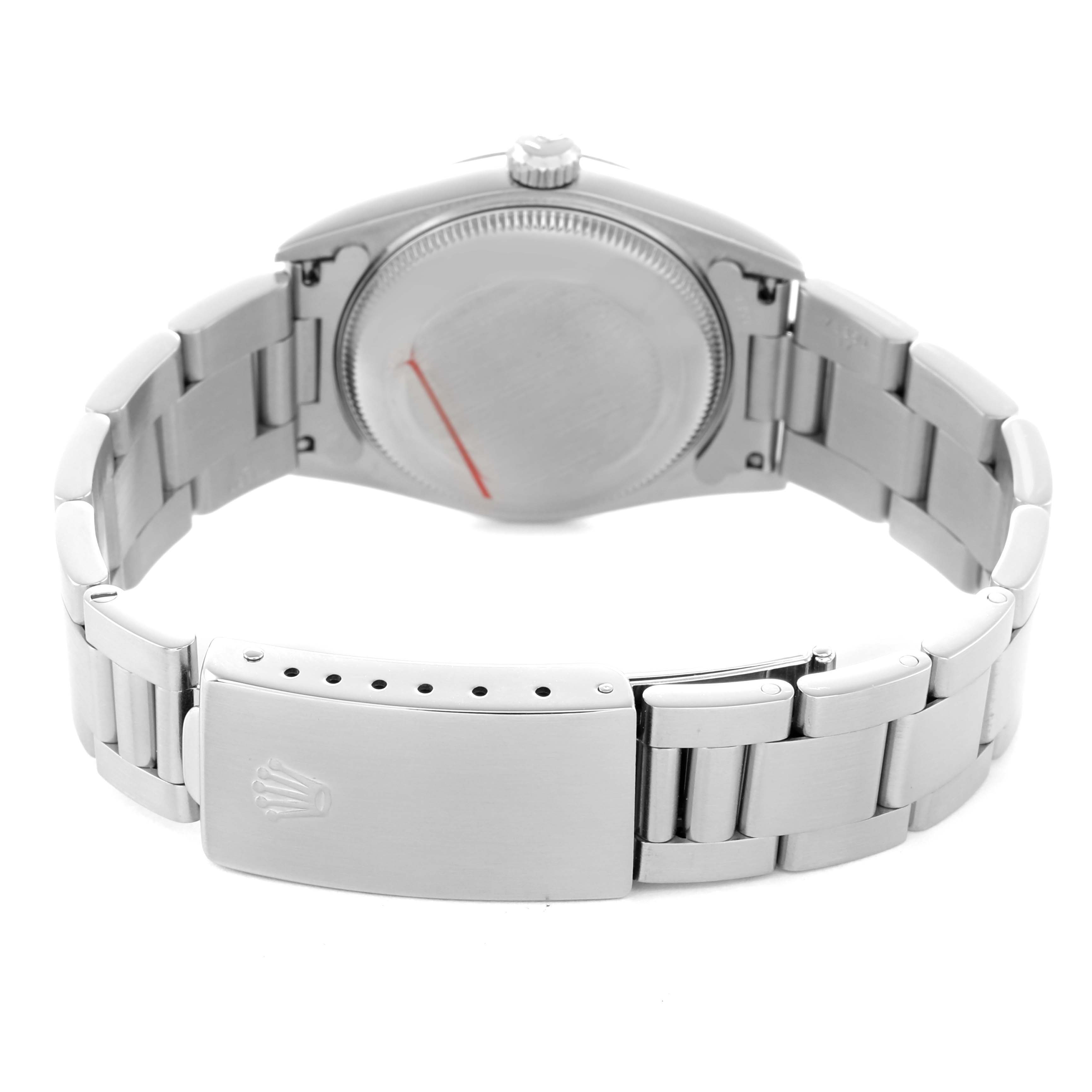 The image shows the back view of the Rolex Oyster Perpetual 67480 Women's Stainless Steel Pink Dial, highlighting its clasp and bracelet.