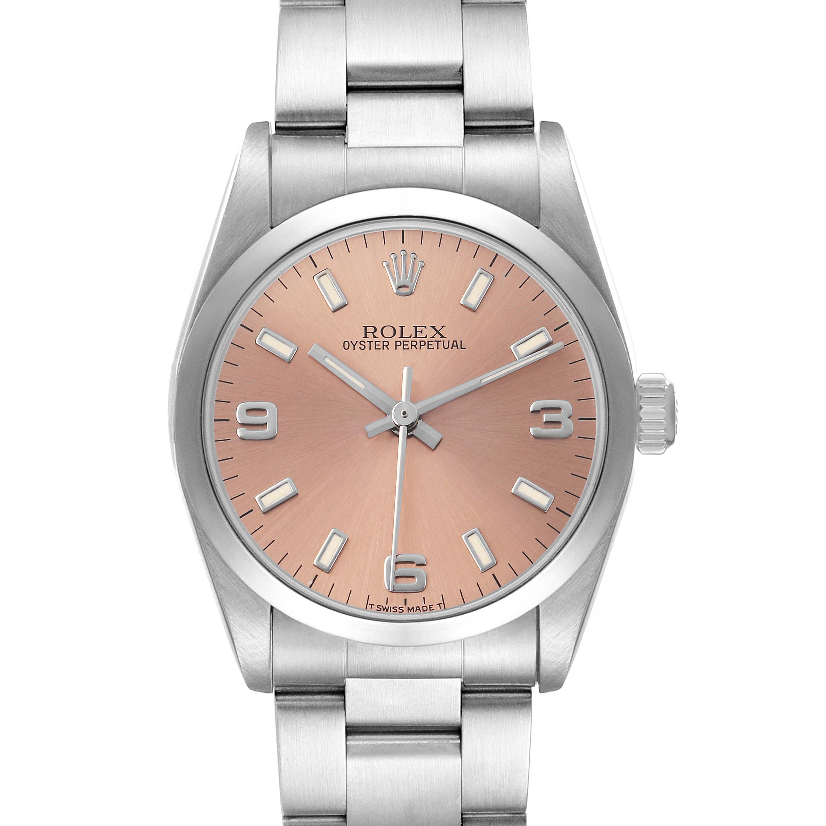 The Rolex Oyster Perpetual 67480 Women's Stainless Steel Pink Dial watch is shown from the front, highlighting its dial, case, and bracelet.