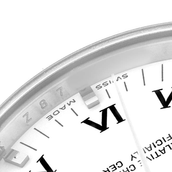 The image shows a close-up of the dial and bezel of a Rolex Oyster Perpetual 177200 Women's Stainless Steel White Dial watch, emphasizing part of the Roman numerals.