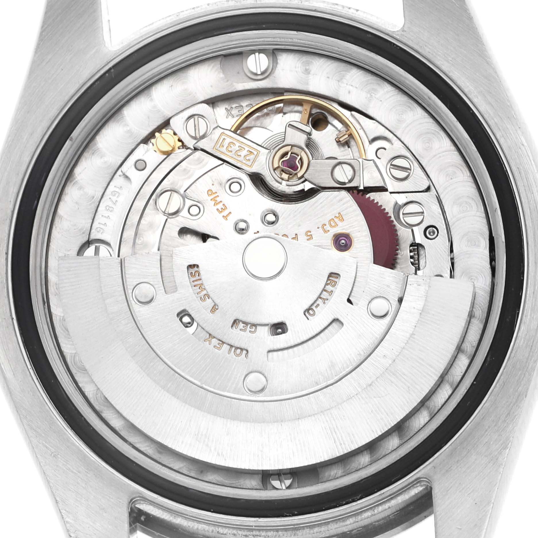 The image shows the Rolex Oyster Perpetual 177200 Women's Stainless Steel White Dial's movement from the back, highlighting the rotor and internal components.