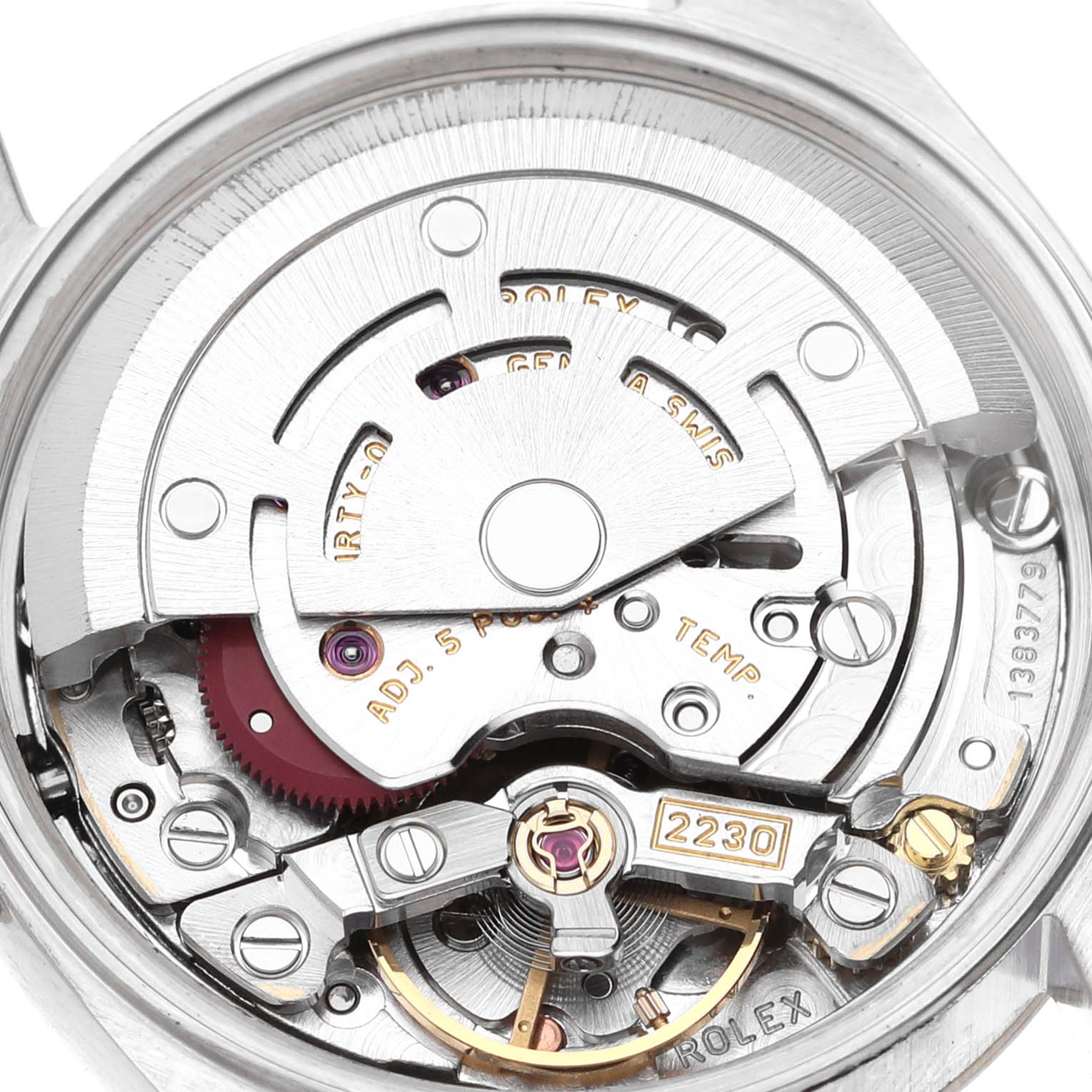 This image shows the internal movement mechanism of the Rolex Oyster Perpetual 76094 Women
s Stainless Steel Pink Dial 76094 Women
s Stainless Steel Pink Dial watch, focusing on the rotor and gears.