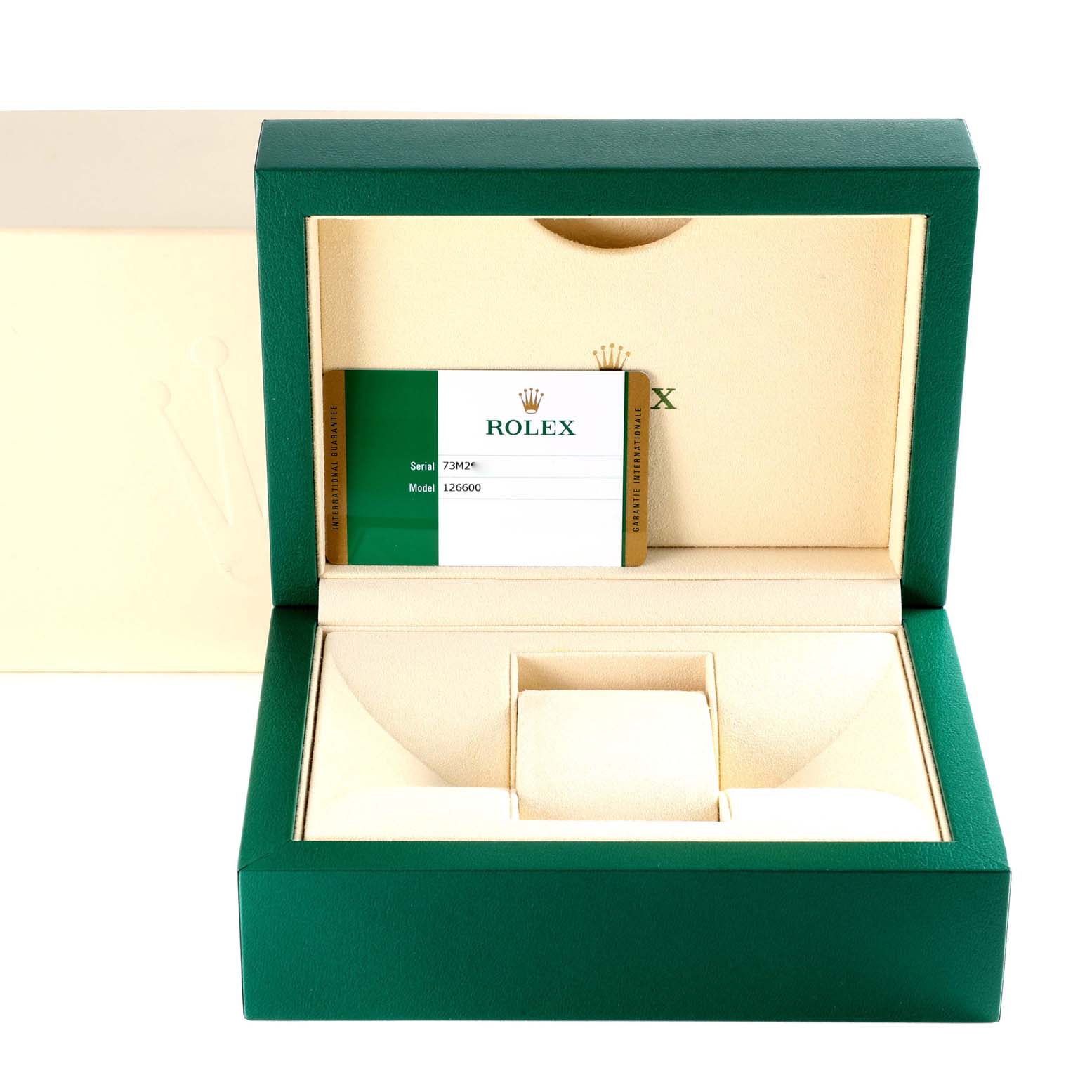 The image depicts an open Rolex Sea-Dweller 126600 Men
s Stainless Steel Black Dial 126600 Men
s Stainless Steel Black Dial watch box showing the inner packaging and warranty card.