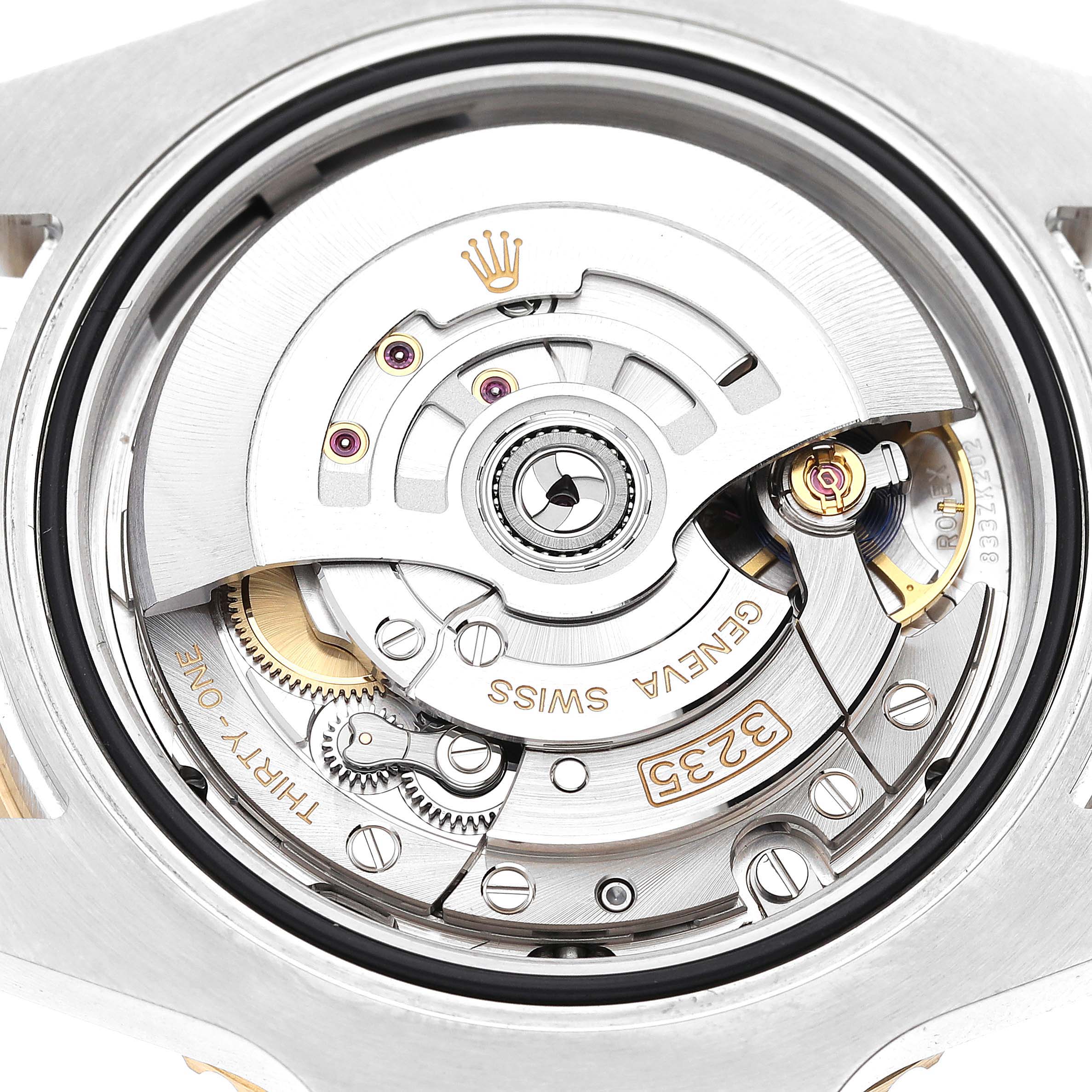 This image shows the internal movement mechanism of a Rolex Submariner 126613LN Men
s Steel and Gold (two tone) Black Dial 126613LN Men
s Steel and Gold (two tone) Black Dial watch viewed from the back.