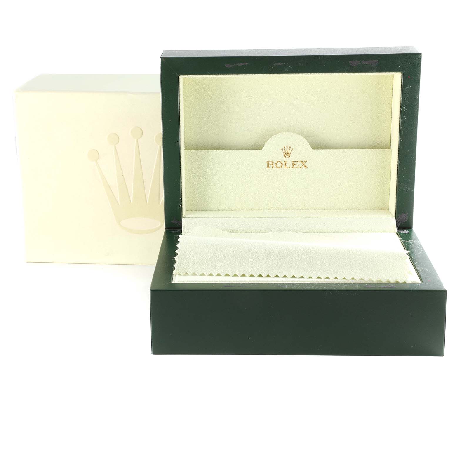 This image shows an open Rolex Submariner 16610 Men
s Stainless Steel Black Dial 16610 Men
s Stainless Steel Black Dial watch box and its outer cream packaging with the Rolex logo.