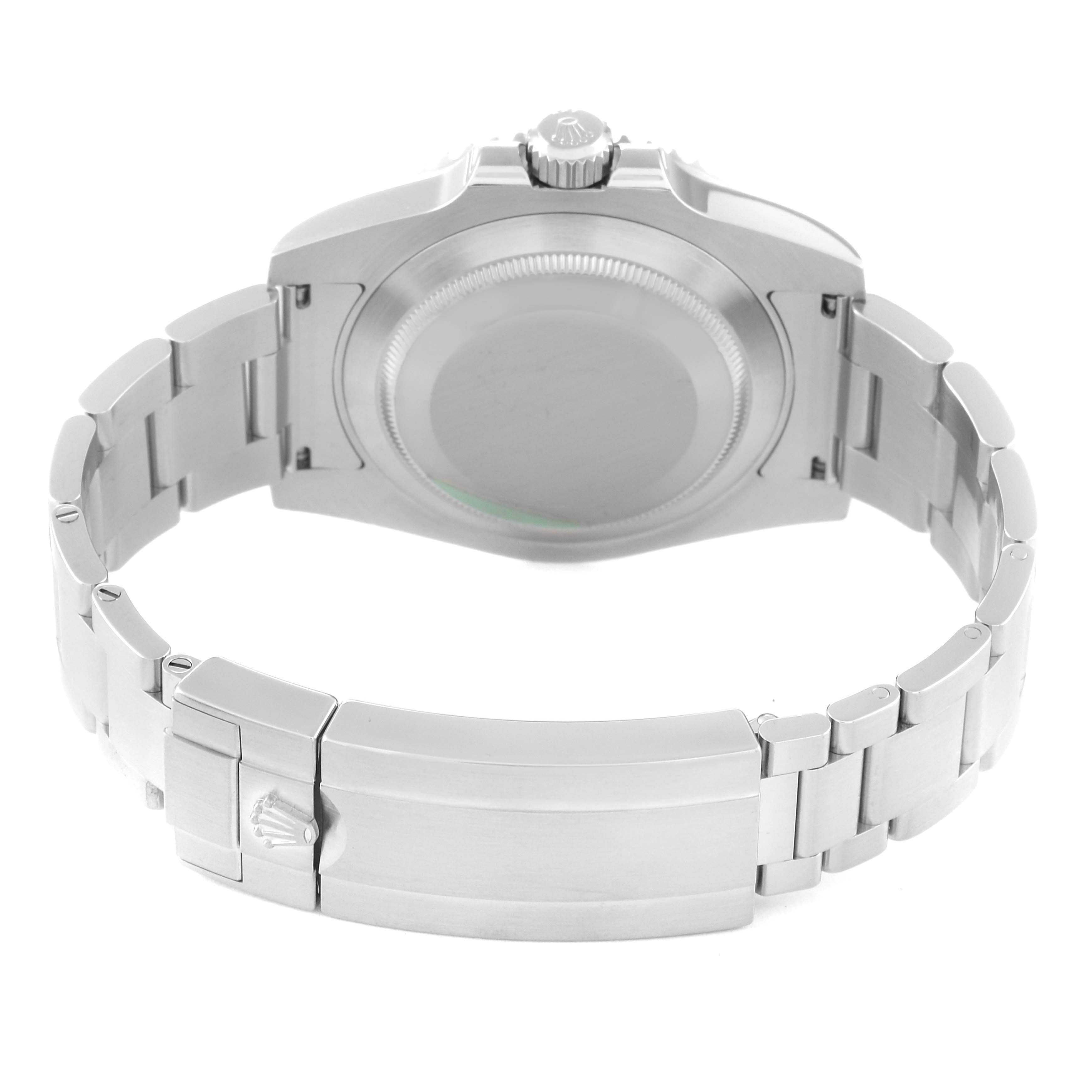 The image shows the back view of the Rolex Submariner 116610LV Men's Stainless Steel Green Dial 116610LV Men's Stainless Steel Green Dial, highlighting its case back and bracelet with the clasp.