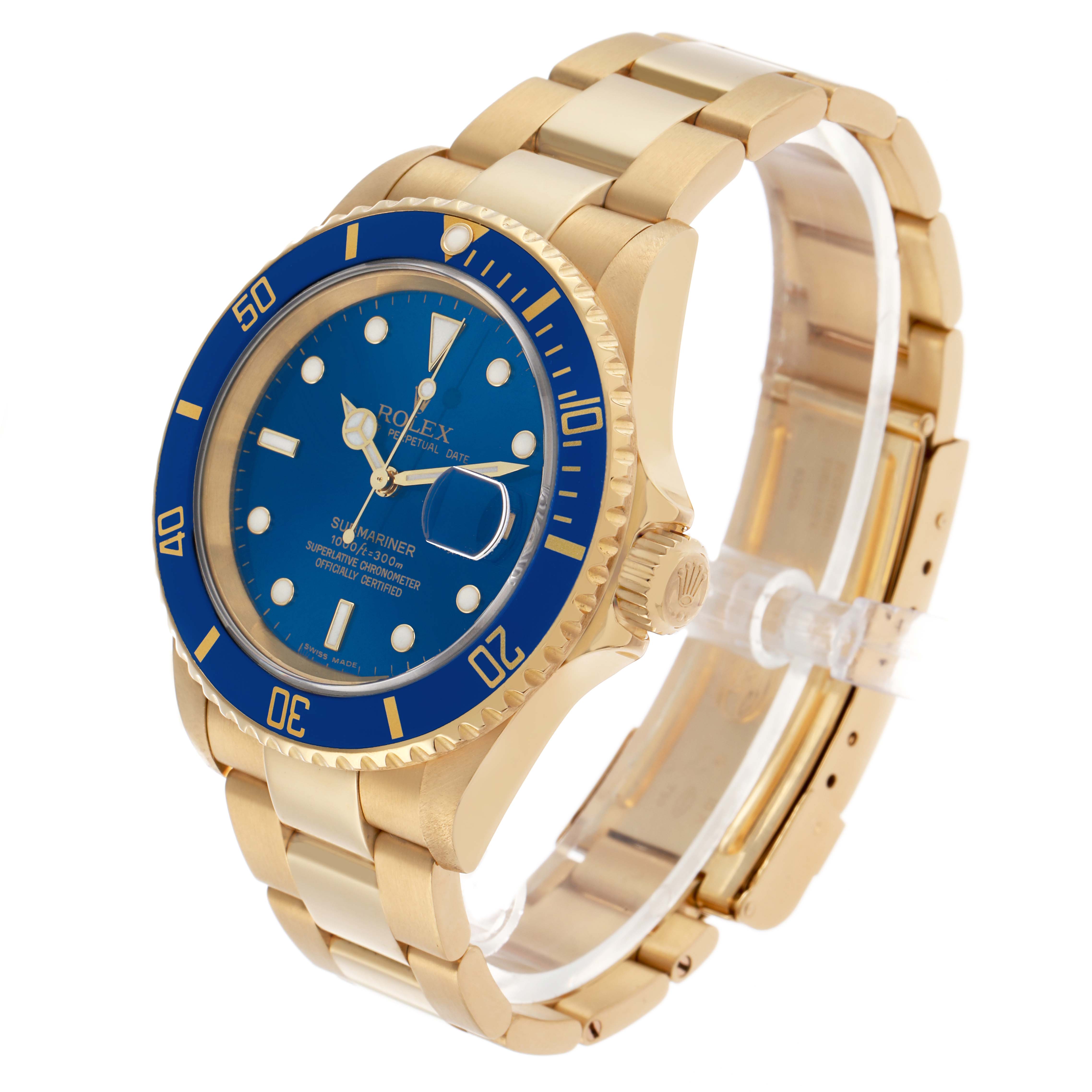 The Rolex Submariner 16618 Men's Yellow Gold Blue Dial watch is shown at an angled side view, showcasing the dial, case, bezel, and bracelet.