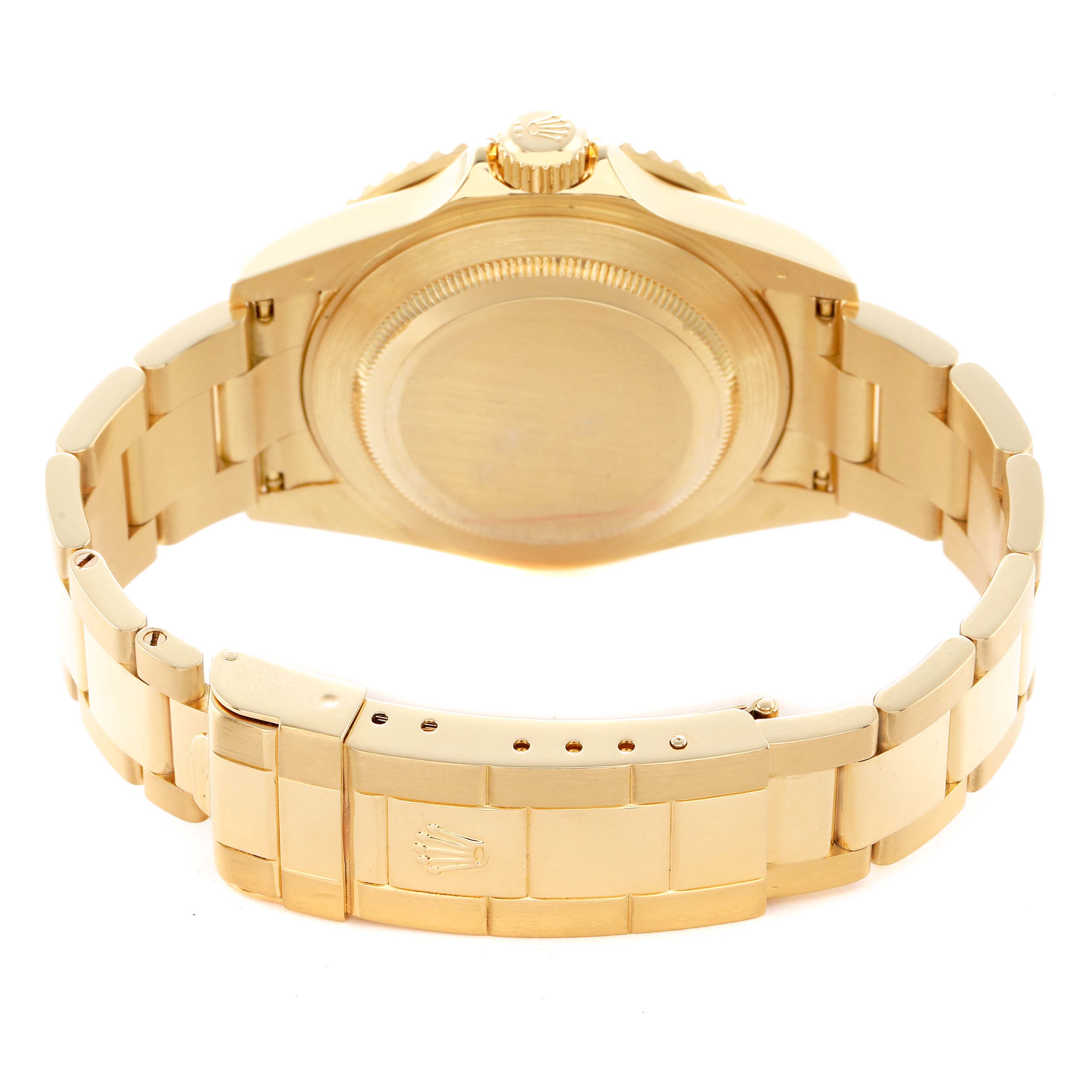 The image shows a Rolex Submariner 16618 Men's Yellow Gold Blue Dial from the rear, highlighting the bracelet, clasp, and case back.