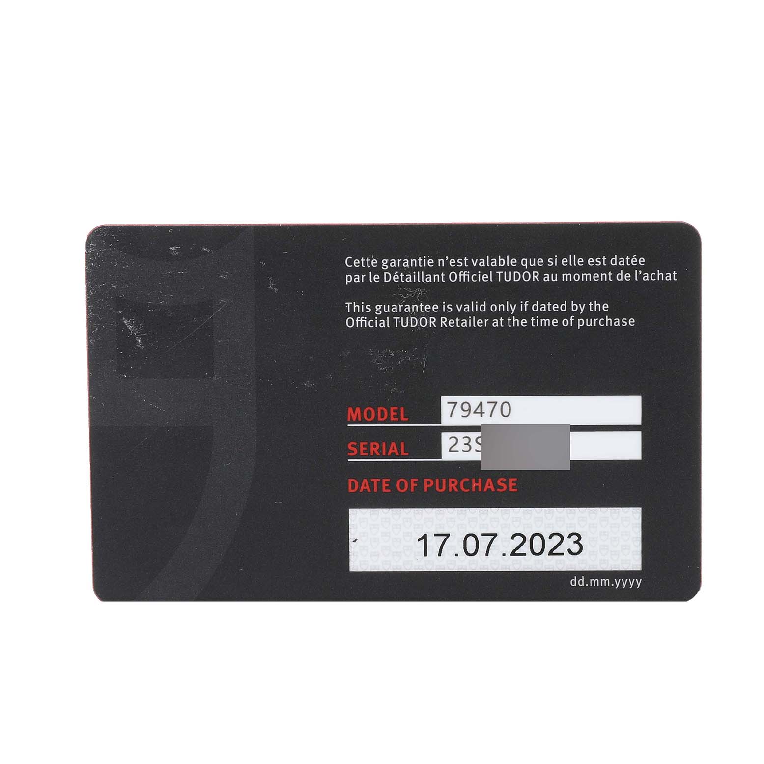 The image shows a warranty card for the Tudor Heritage Black Bay M79470 Men
s Stainless Steel Black Dial M79470 Men
s Stainless Steel Black Dial model with model number 79470.