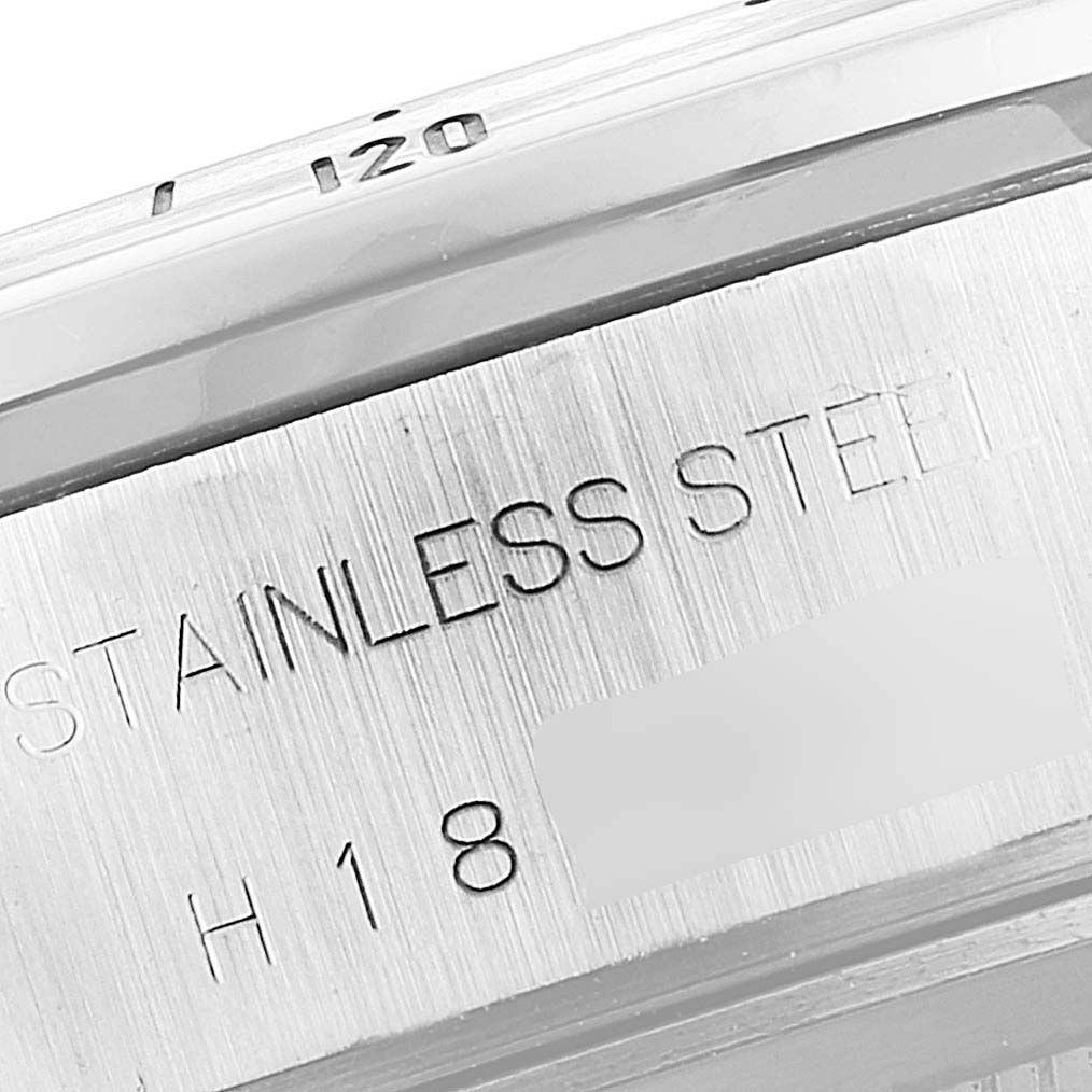 The image shows a close-up of the case back of a Tudor Prince 79280 Men
s Stainless Steel Black Dial 79280 Men
s Stainless Steel Black Dial watch, highlighting the "STAINLESS STEEL" engraving.