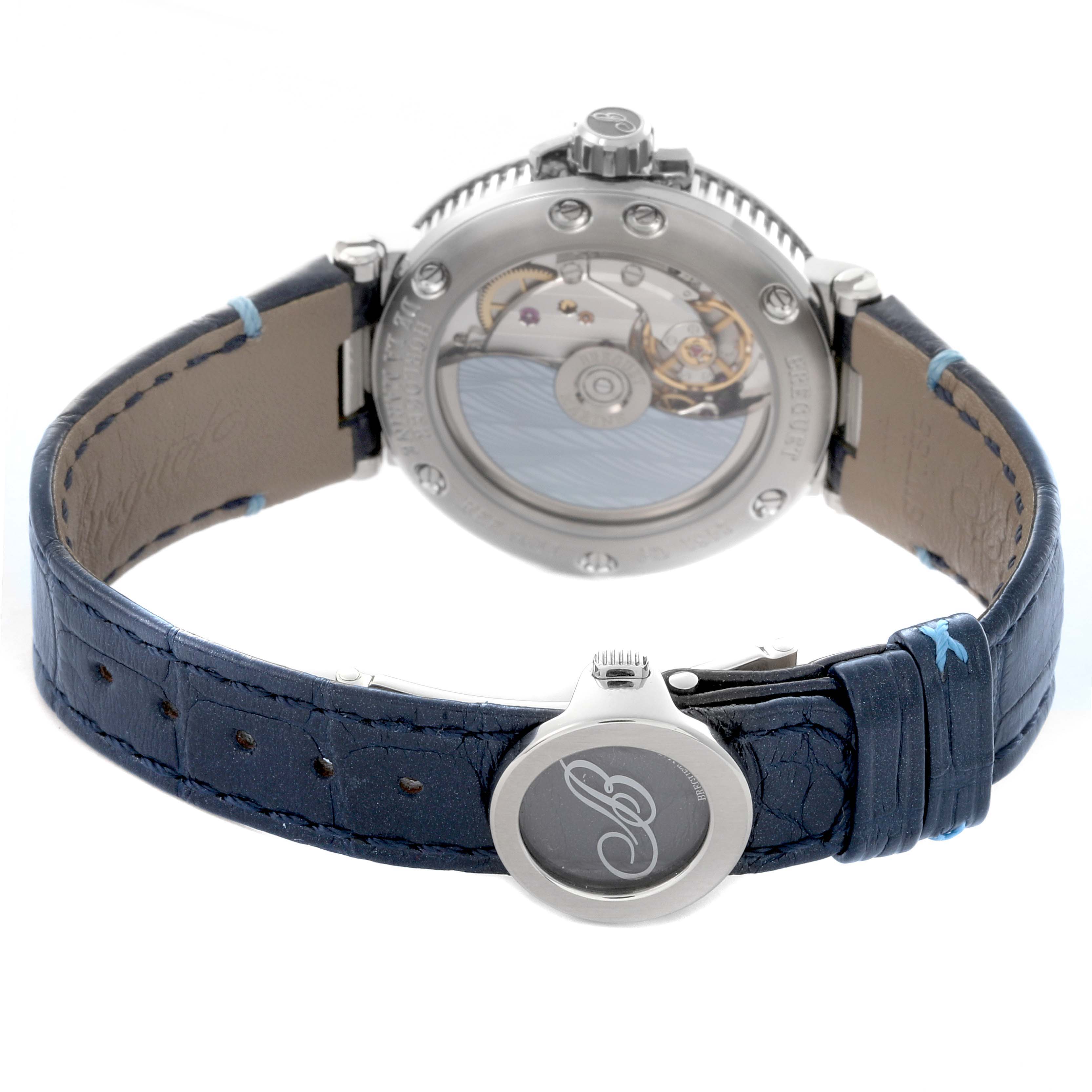 The image shows the back view of the Breguet 9517ST/E2/984 Women's Stainless Steel Blue Dial 9517ST/E2/984 Women's Stainless Steel Blue Dial Marine watch, displaying the movement and blue leather strap.