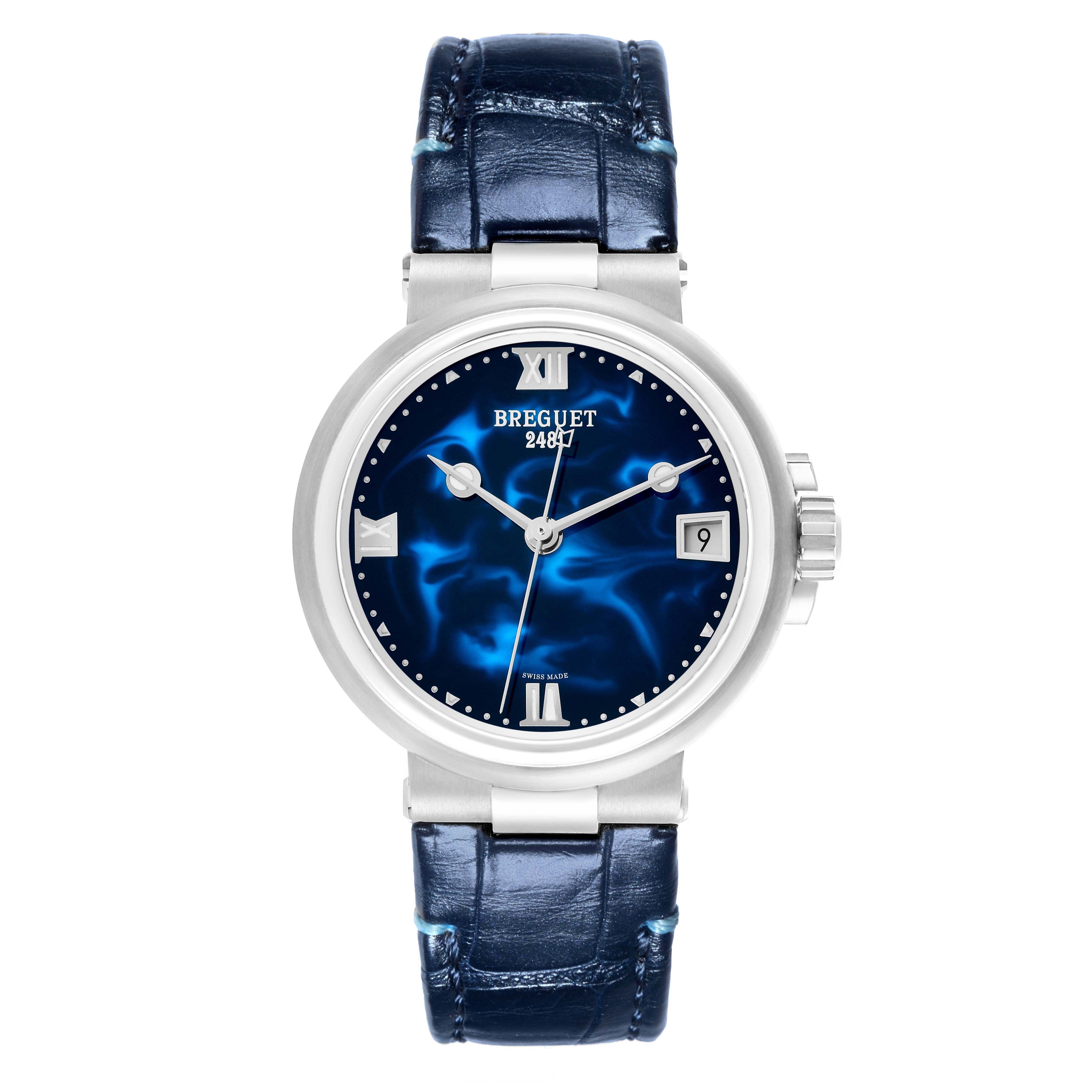 The Breguet Marine 9517ST/E2/984 Men's Stainless Steel Blue Dial model is shown from the front, highlighting the blue dial, Roman numerals, date window, and blue leather strap.
