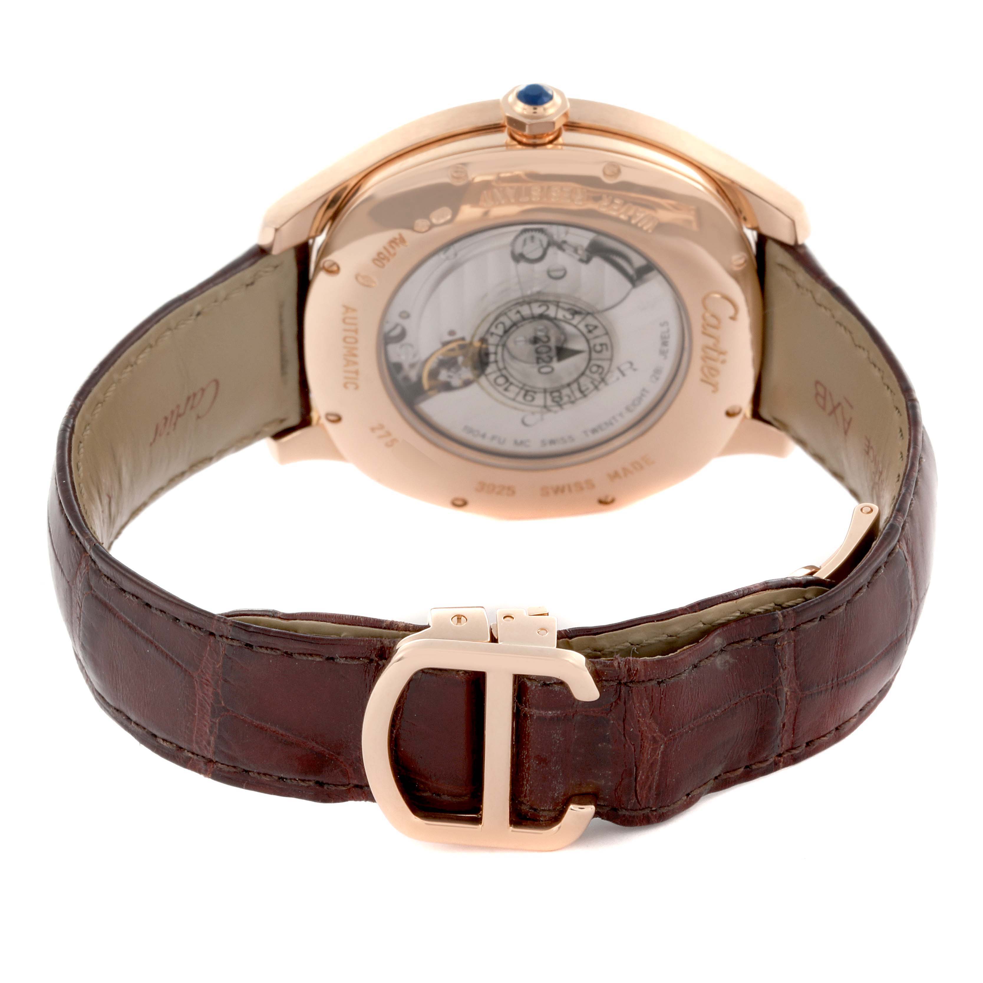 The image shows the back view of the Drive de Cartier watch by Cartier, highlighting its buckle, strap, and open case back.