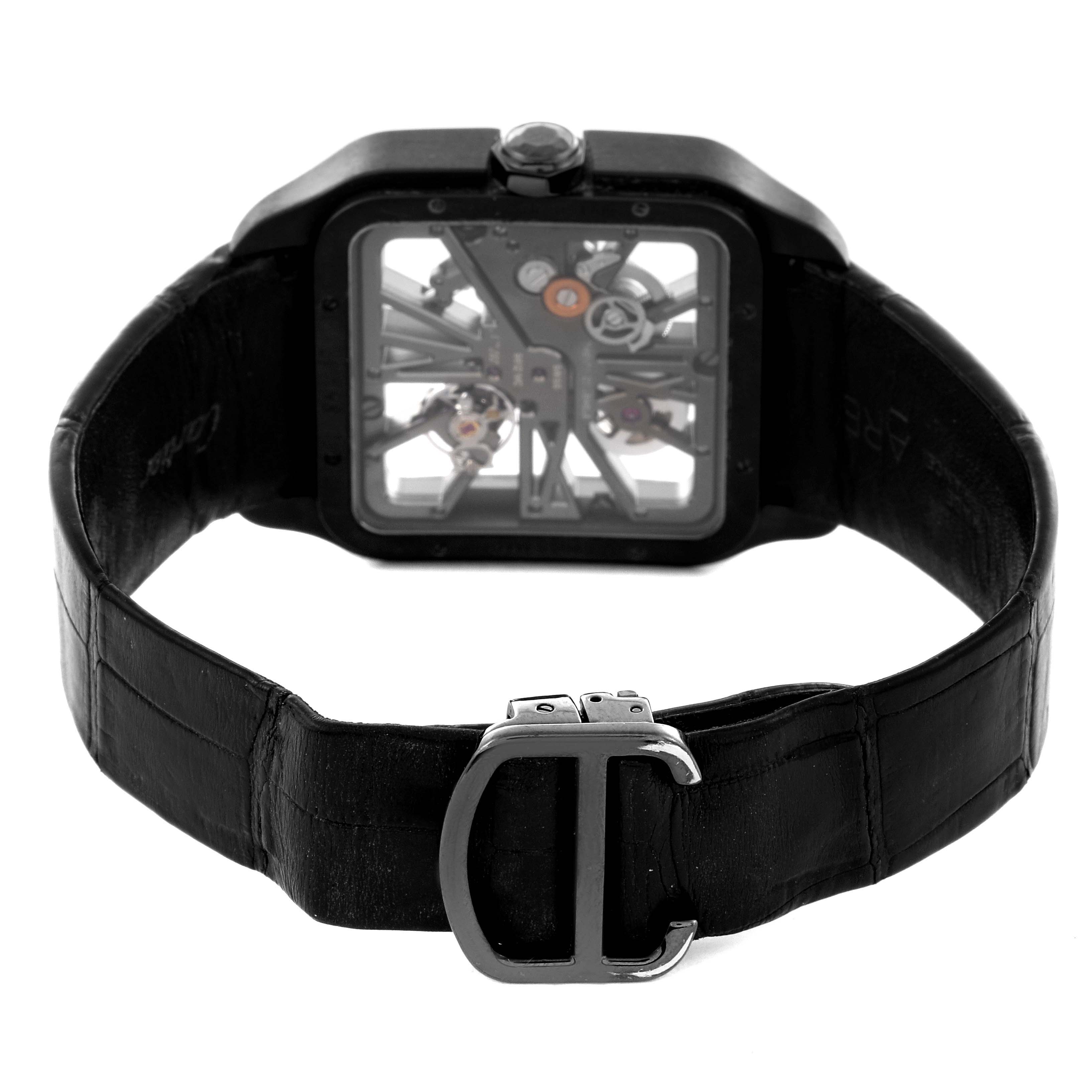 The image shows the back of a Cartier Santos W2020052 Men's Titanium Transparent Dial W2020052 Men's Titanium Transparent Dial watch with a black strap and visible mechanical details.