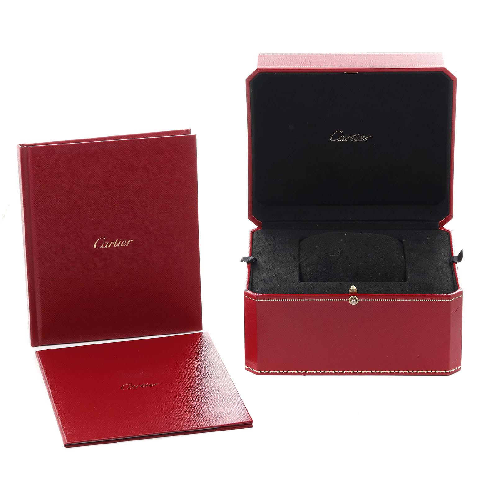 The image shows the red Cartier Santos W2020057 Men's Rose Gold Transparent Dial W2020057 Men's Rose Gold Transparent Dial watch box and accompanying documents at an eye-level angle.