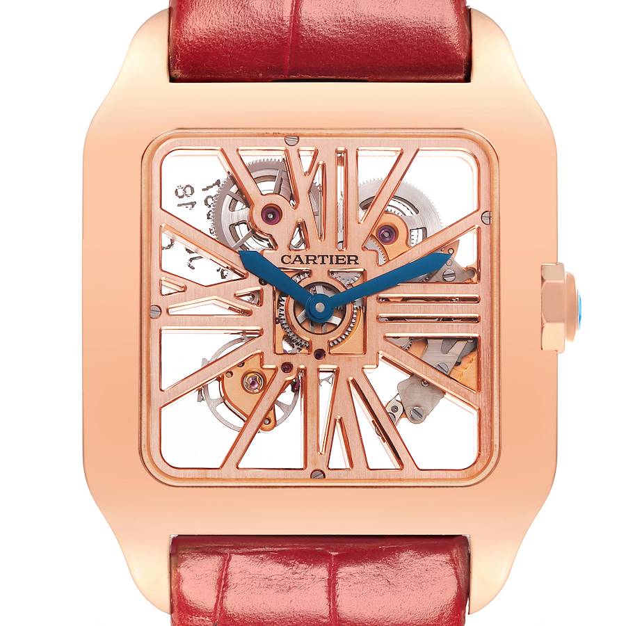 The Cartier Santos watch is shown from the front, highlighting its skeleton dial, blue hands, and pink gold case.