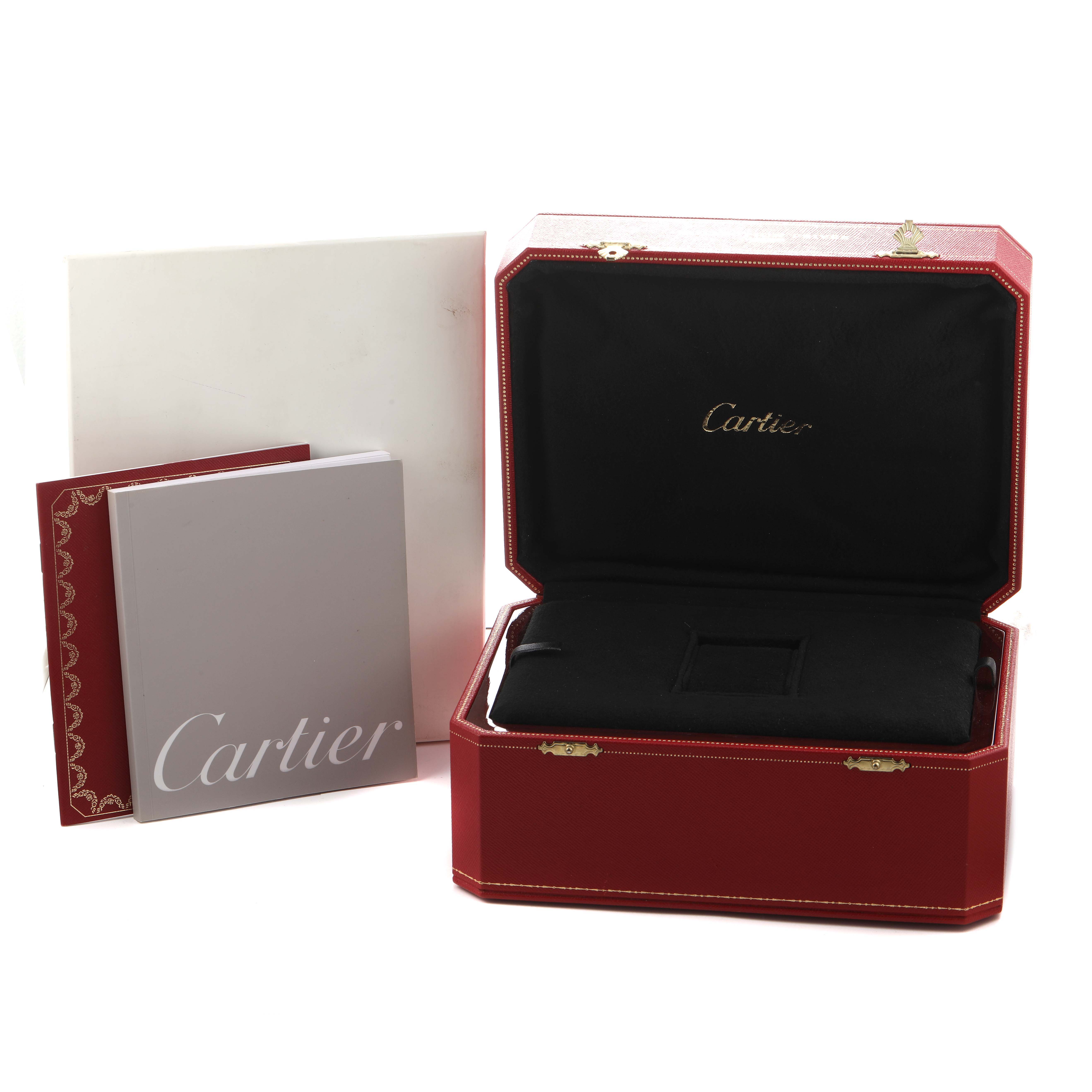 The image shows a Cartier Tortue W1580045 Men's Rose Gold Silver Dial watch box open, revealing its interior, alongside branded booklets.