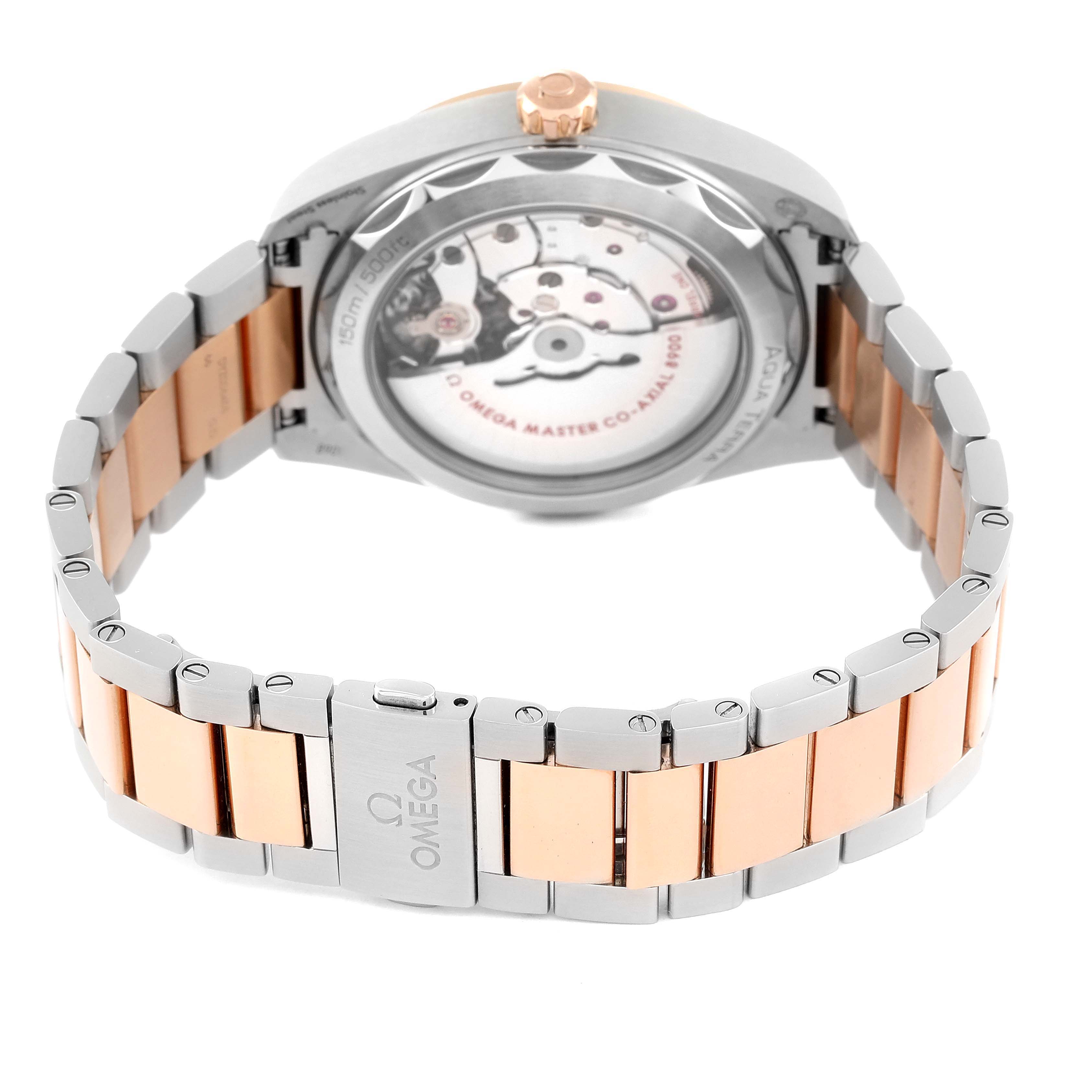This image shows the back of an Omega Aqua Terra 220.20.41.21.06.001 Men's Steel and Gold (two tone) Grey Dial 220.20.41.21.06.001 Men's Steel and Gold (two tone) Grey Dial watch, highlighting its stainless steel and rose gold bracelet and the open case back.