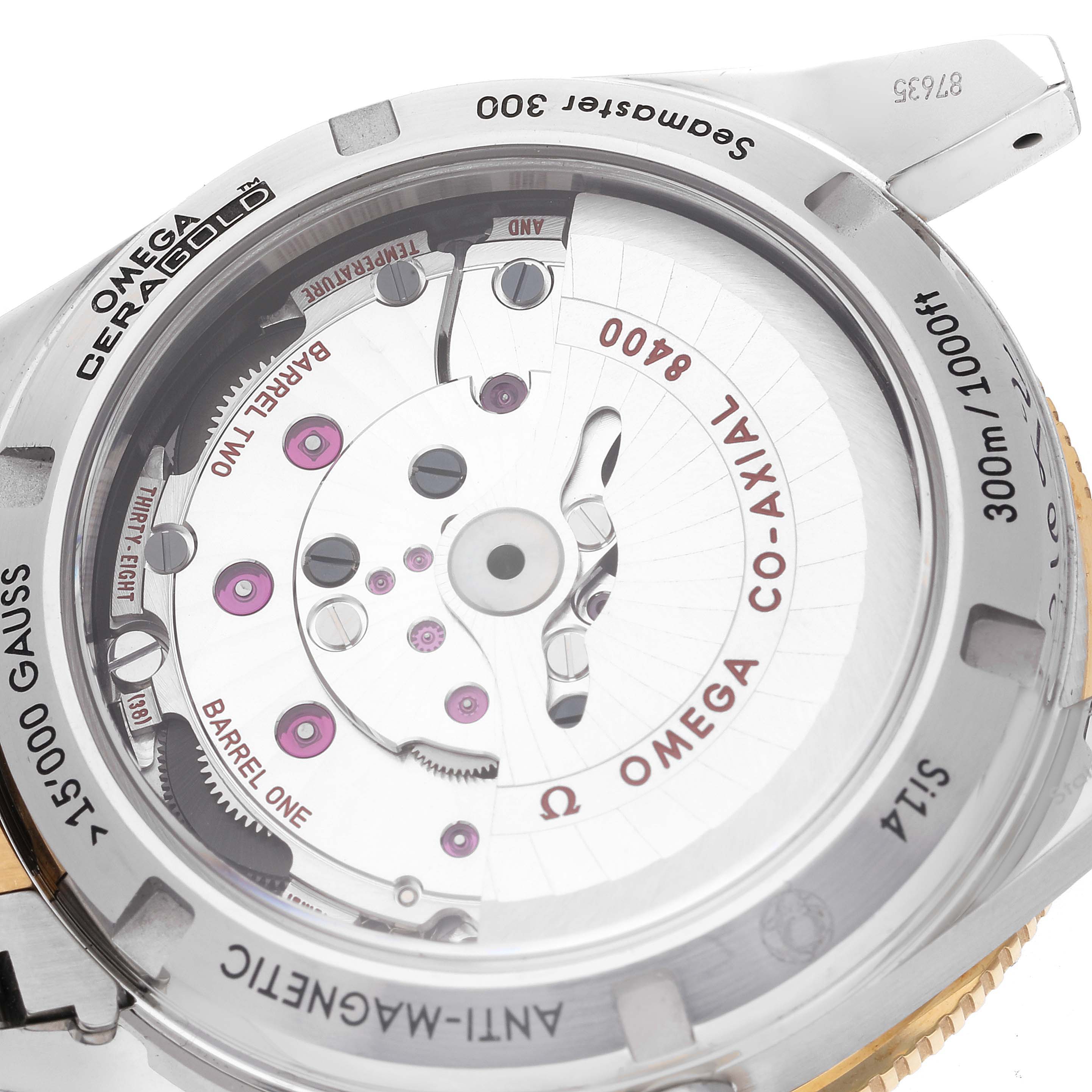 This image shows the back of the Omega Seamaster 233.20.41.21.01.002 Men's Steel and Gold (two tone) Black Dial 233.20.41.21.01.002 Men's Steel and Gold (two tone) Black Dial watch, highlighting the movement and co-axial mechanism.