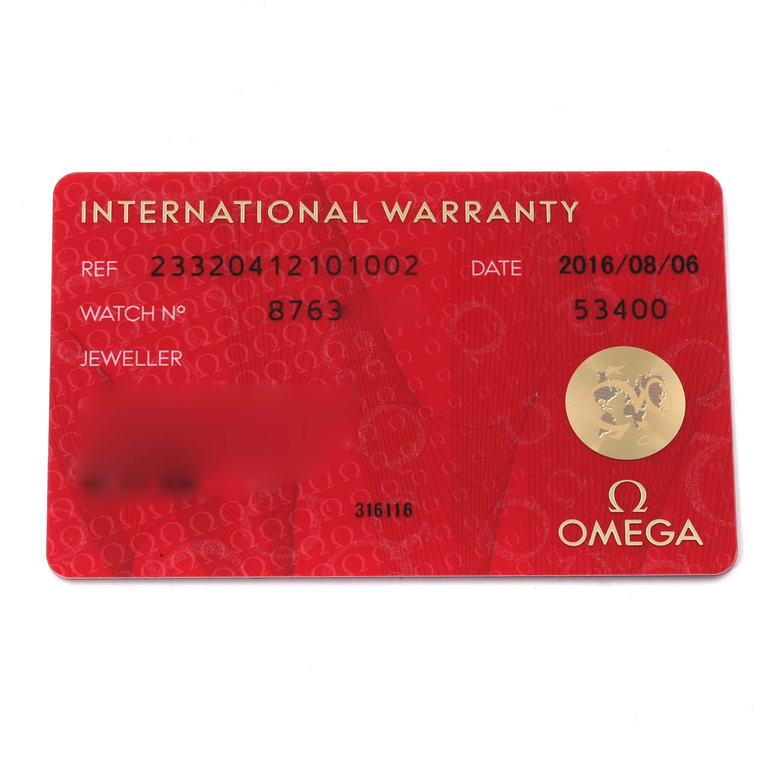 This image shows an Omega Seamaster 233.20.41.21.01.002 Men's Steel and Gold (two tone) Black Dial 233.20.41.21.01.002 Men's Steel and Gold (two tone) Black Dial's International Warranty card from a top-down angle.