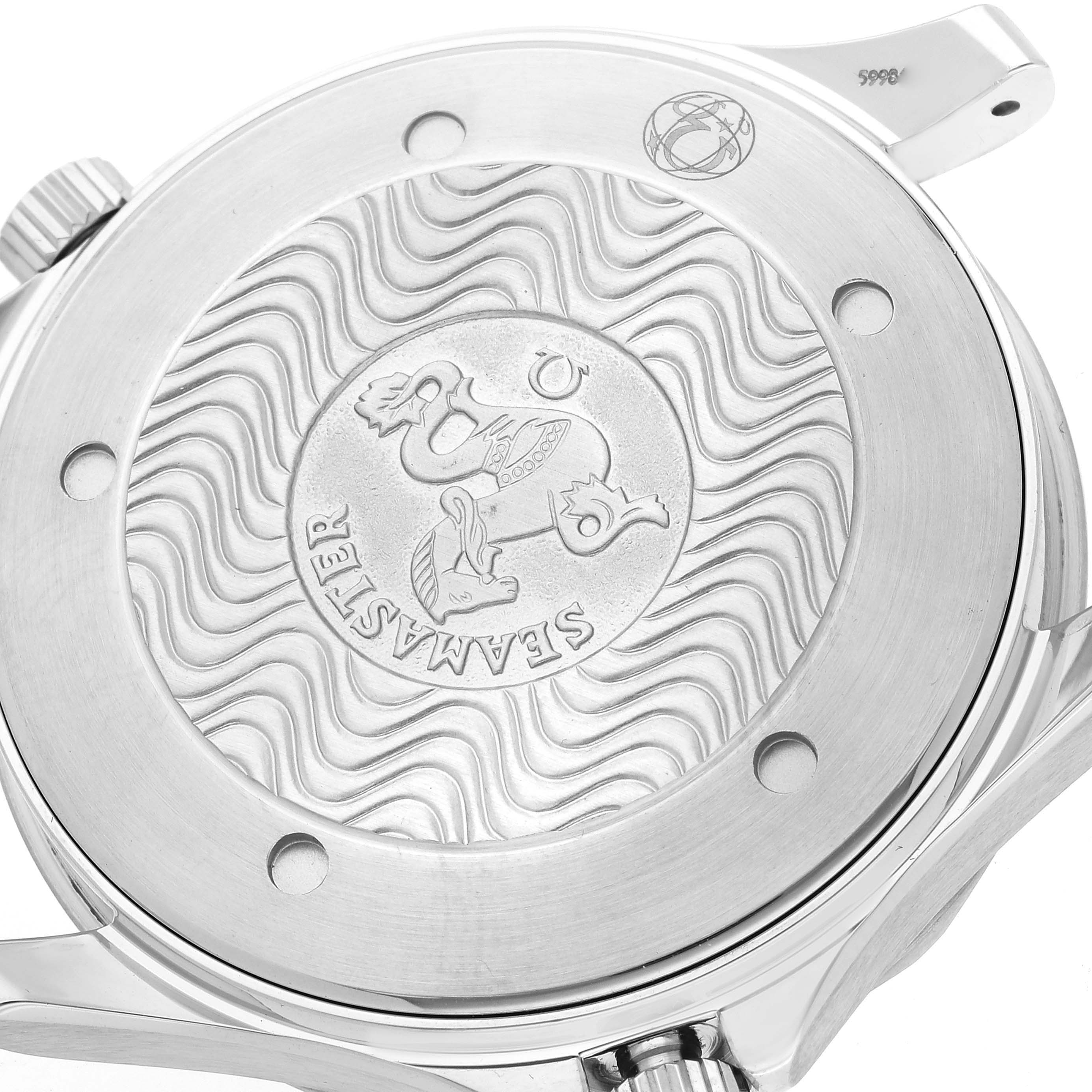 The image shows the case back of an Omega Seamaster 2264.50.00 Men
s Stainless Steel Black Dial 2264.50.00 Men
s Stainless Steel Black Dial watch, highlighting its engraved wave pattern and emblem.