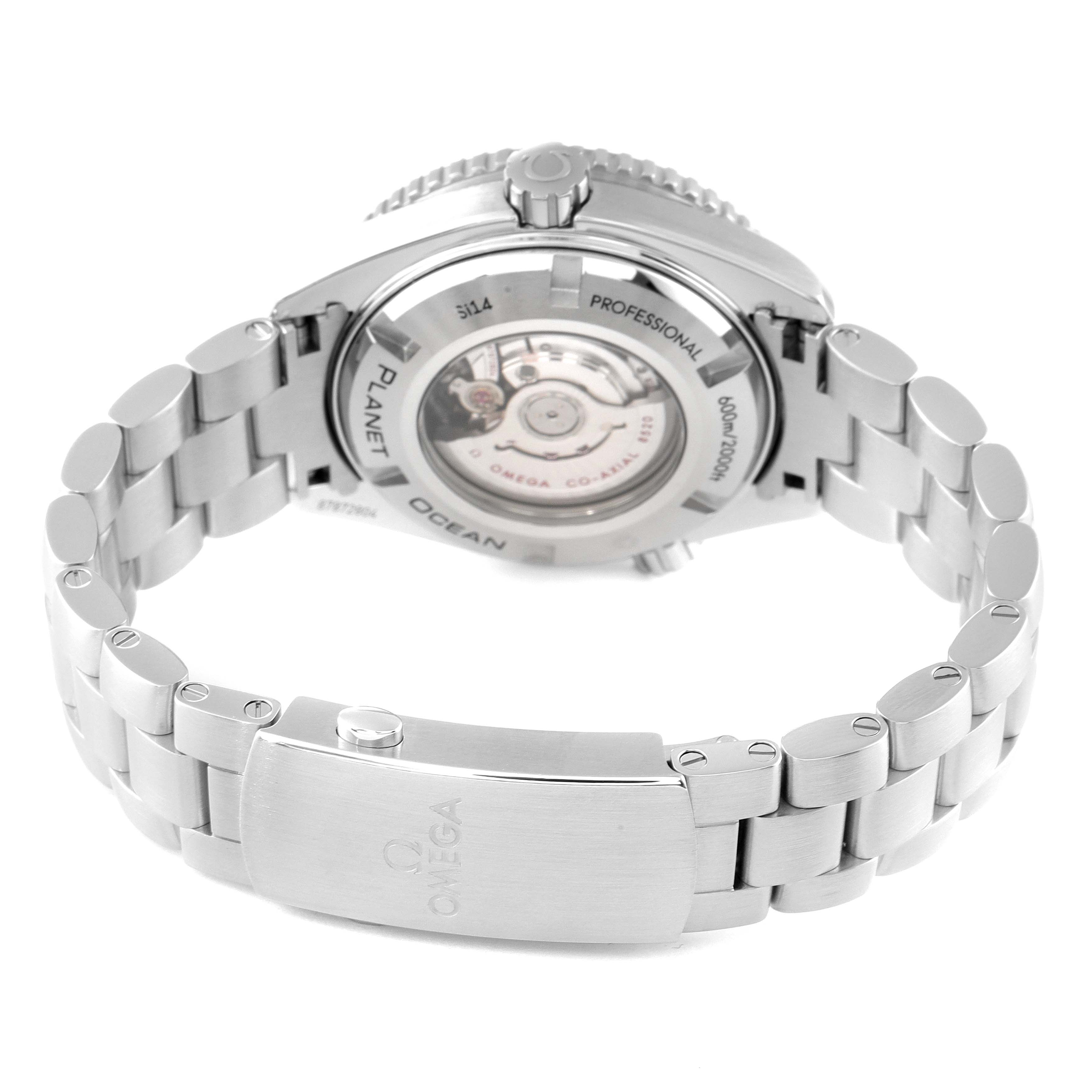 The image shows the back view of the Omega Planet Ocean 232.33.38.20.01.002 Men
s Stainless Steel Black Dial 232.33.38.20.01.002 Men
s Stainless Steel Black Dial watch, displaying the transparent case back and the stainless steel bracelet.