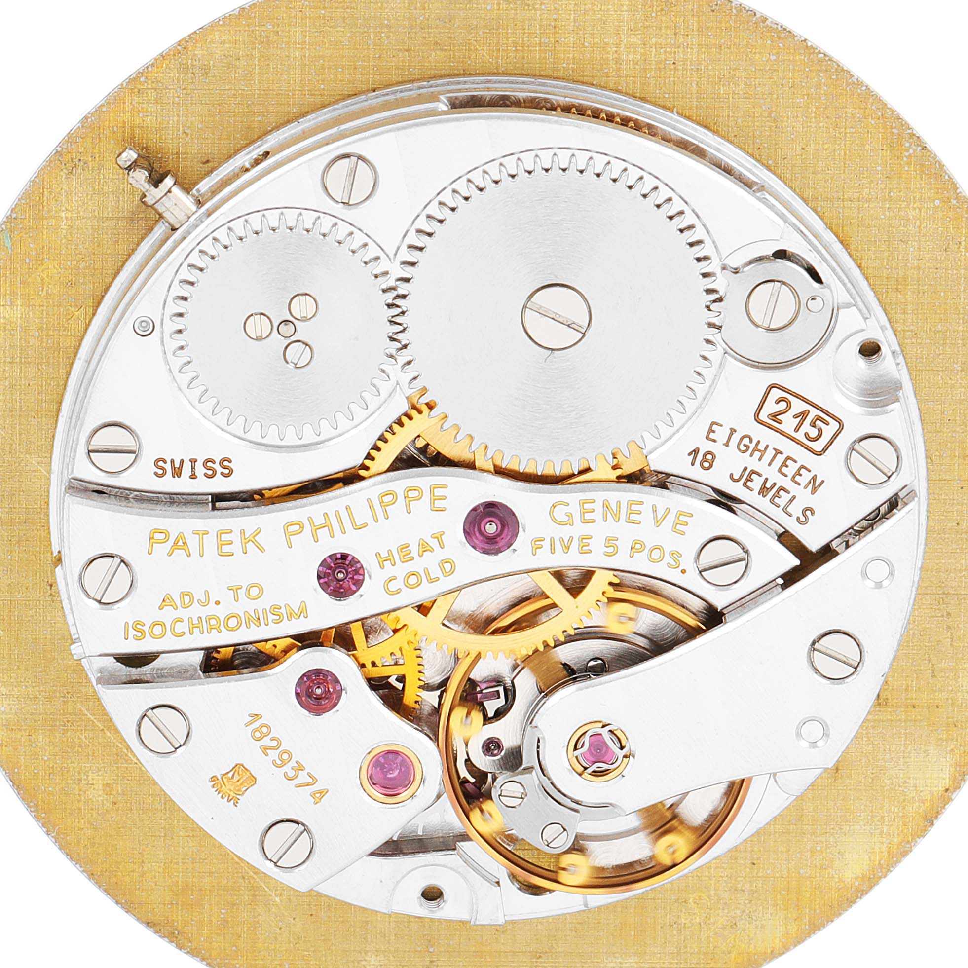 The image shows the interior movement of the Patek Philippe Calatrava 3919 Men's Yellow Gold White Dial 3919 Men's Yellow Gold White Dial watch, highlighting gears and jewels from a top-down perspective.