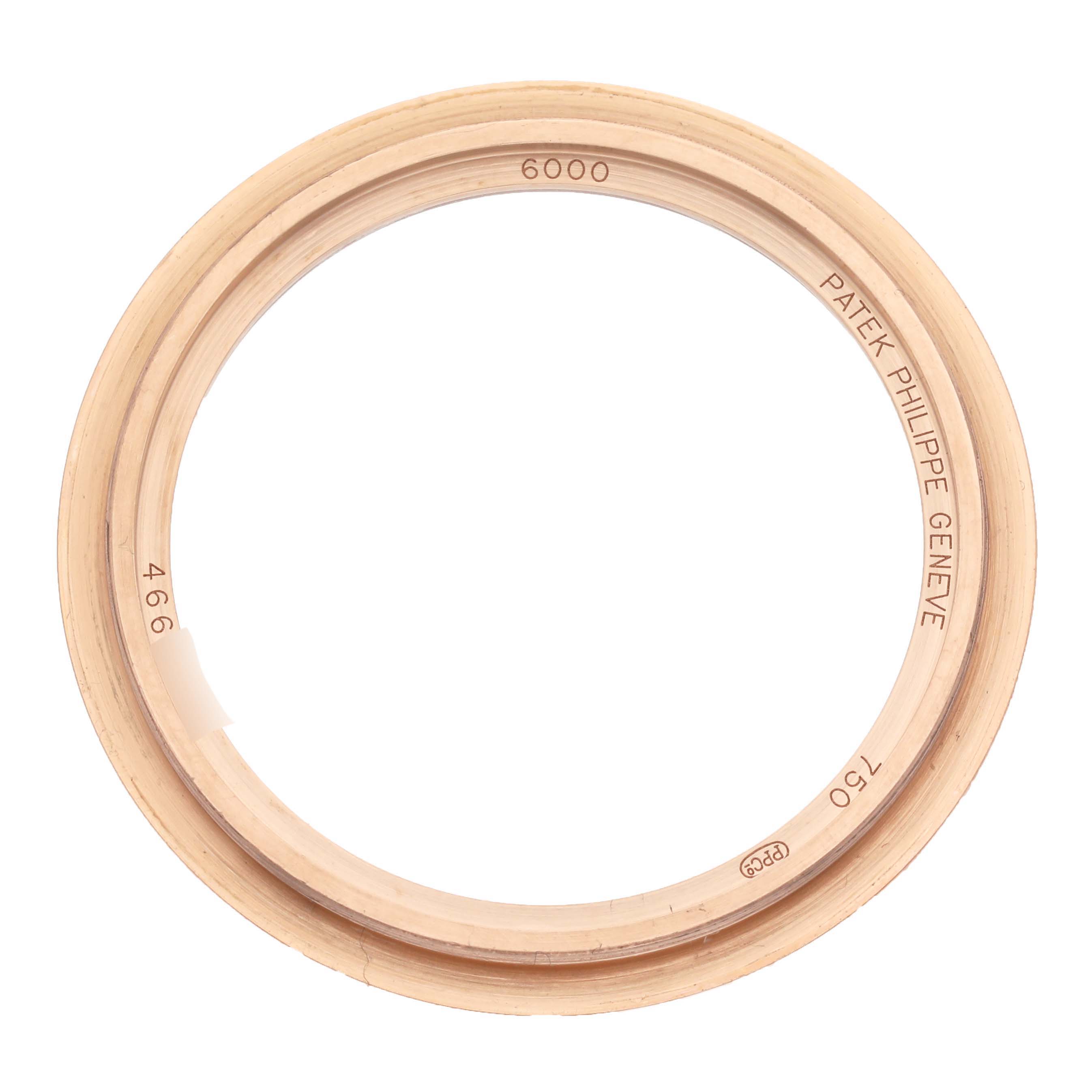 The image shows a top view of a bezel from a Patek Philippe Calatrava 6000R-001 Men's Rose Gold Brown Dial 6000R-001 Men's Rose Gold Brown Dial watch.